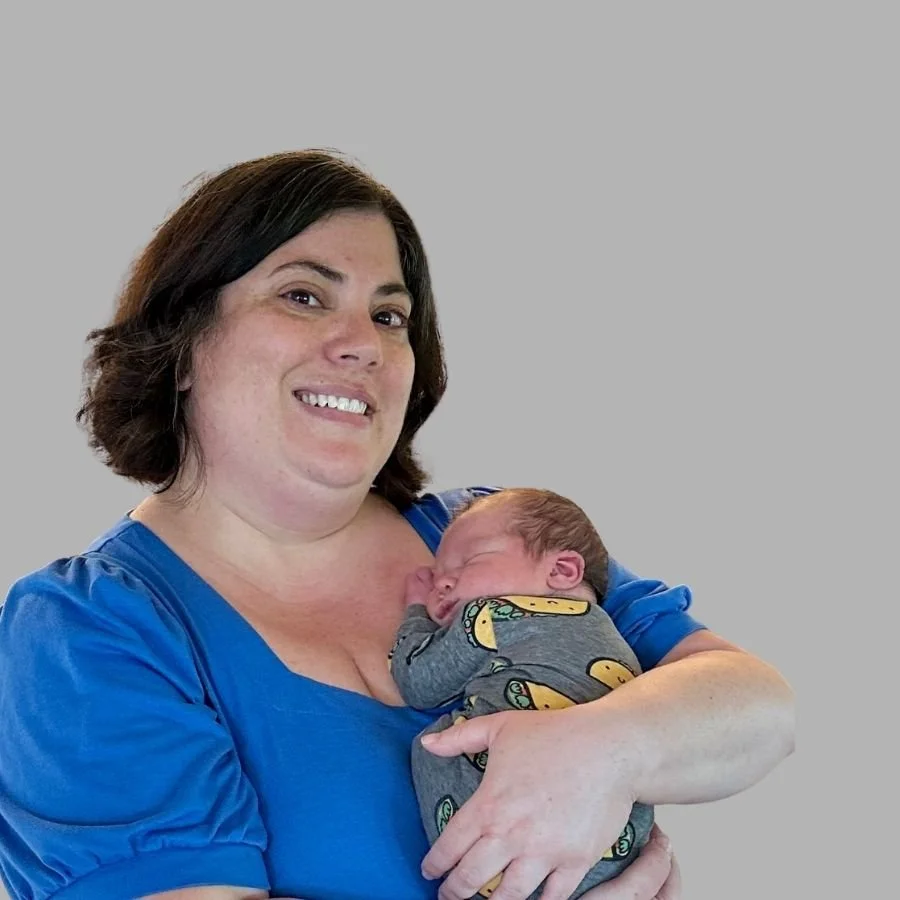 Certified birth doula holding baby whose birth she supported at Lakeland Medical Center in Elkhorn, WI.