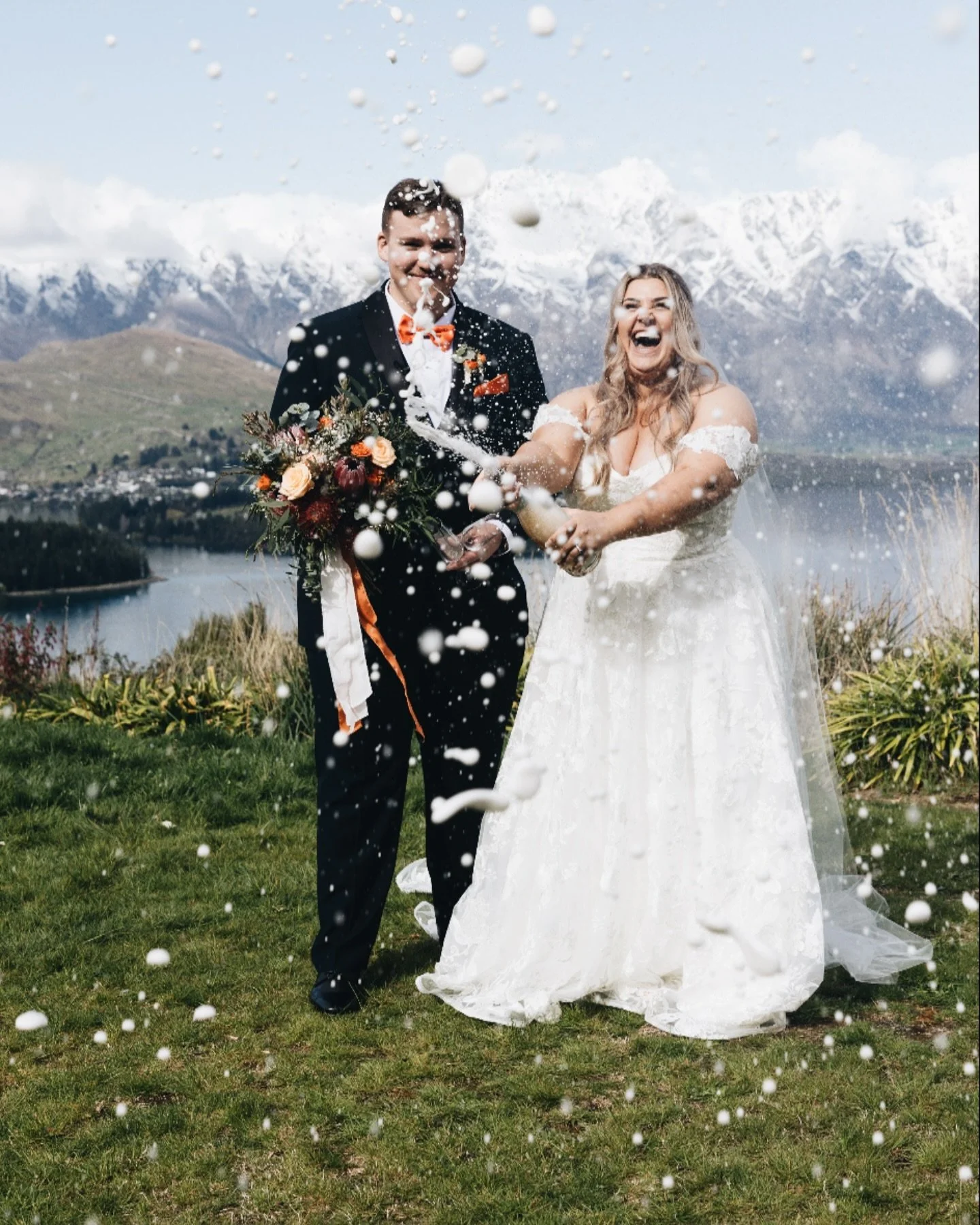 Cheers to Jordan and William! Celebrating love and laughter with a proper champagne pop against the Queenstown mountains. Here&rsquo;s to a life filled with sparkle and adventure!
#ChampagnePop #QueenstownWeddings #AdventureTogether #LoveCelebration