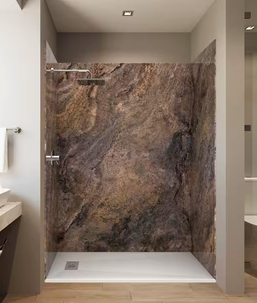Modern bathroom shower with stone wall and glass door, beige walls, and wooden floor.