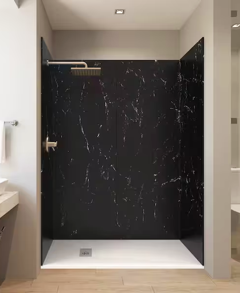 Modern bathroom with a walk-in shower featuring black marble walls, a rainfall showerhead, and a light wood floor.