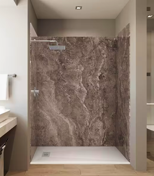 Modern bathroom with stone tile shower, glass door, and beige walls.