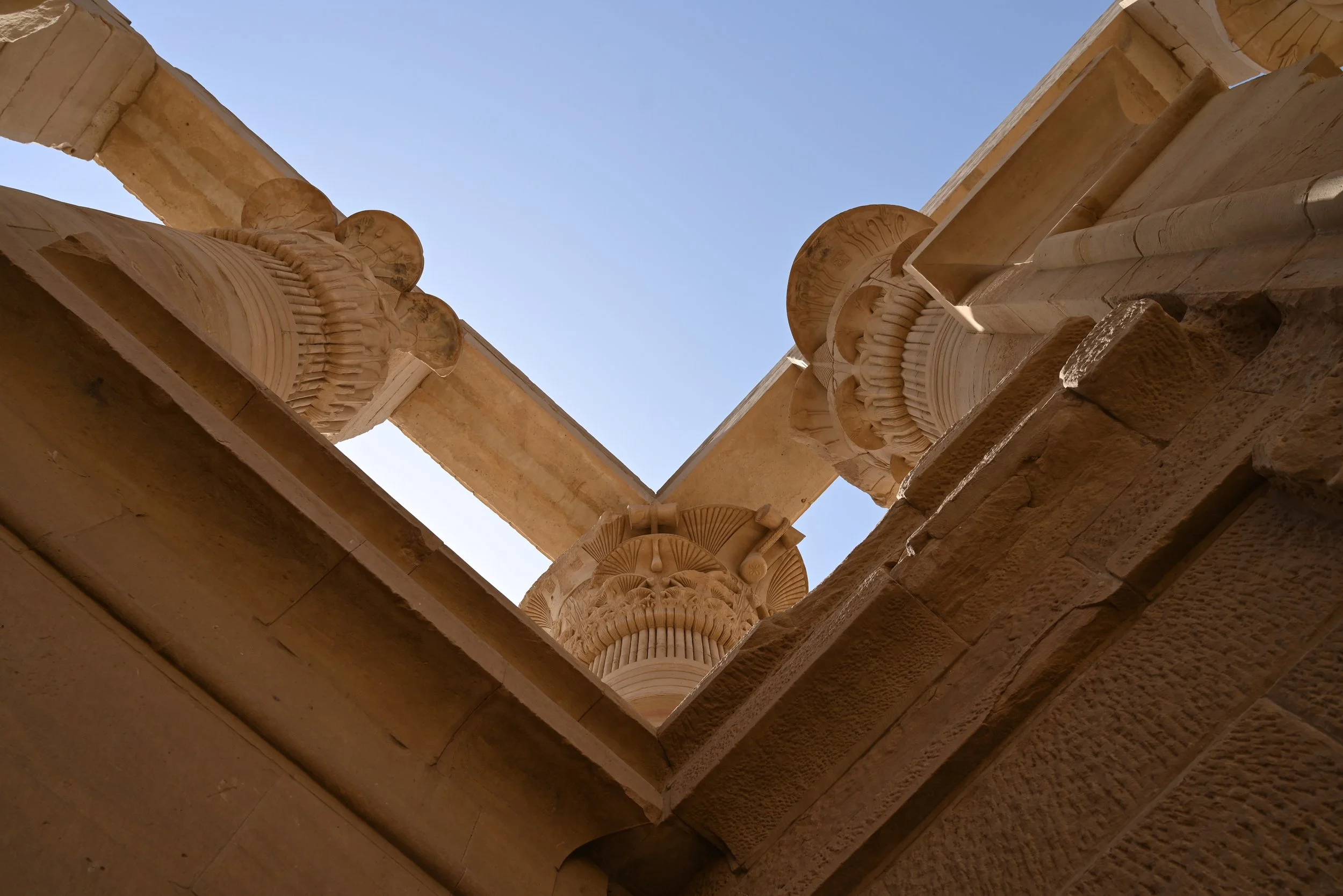 Looking up at stone column work in Philae Egypt. (c) Nicola Sentinella