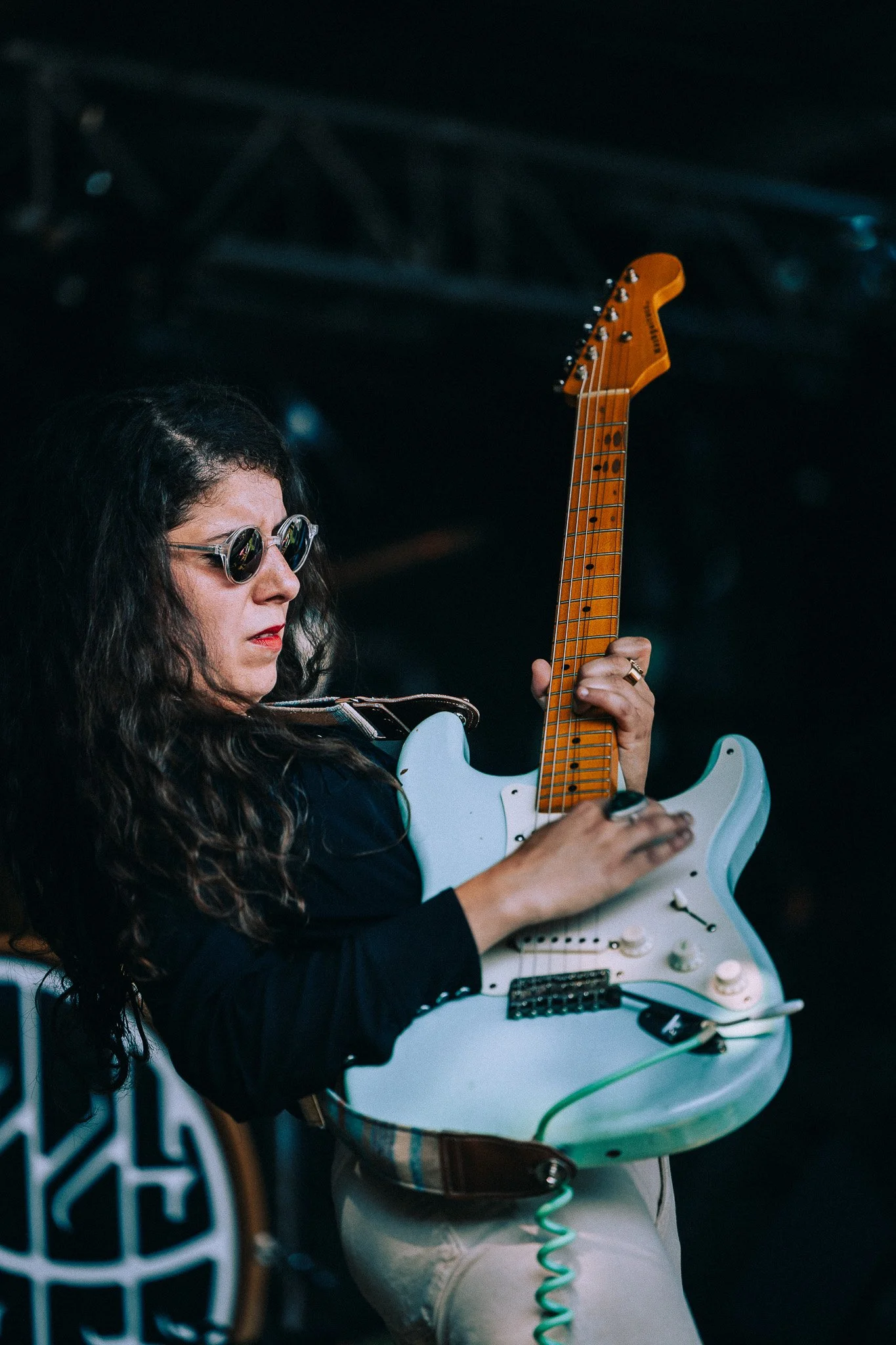 photo of woman playing guitar