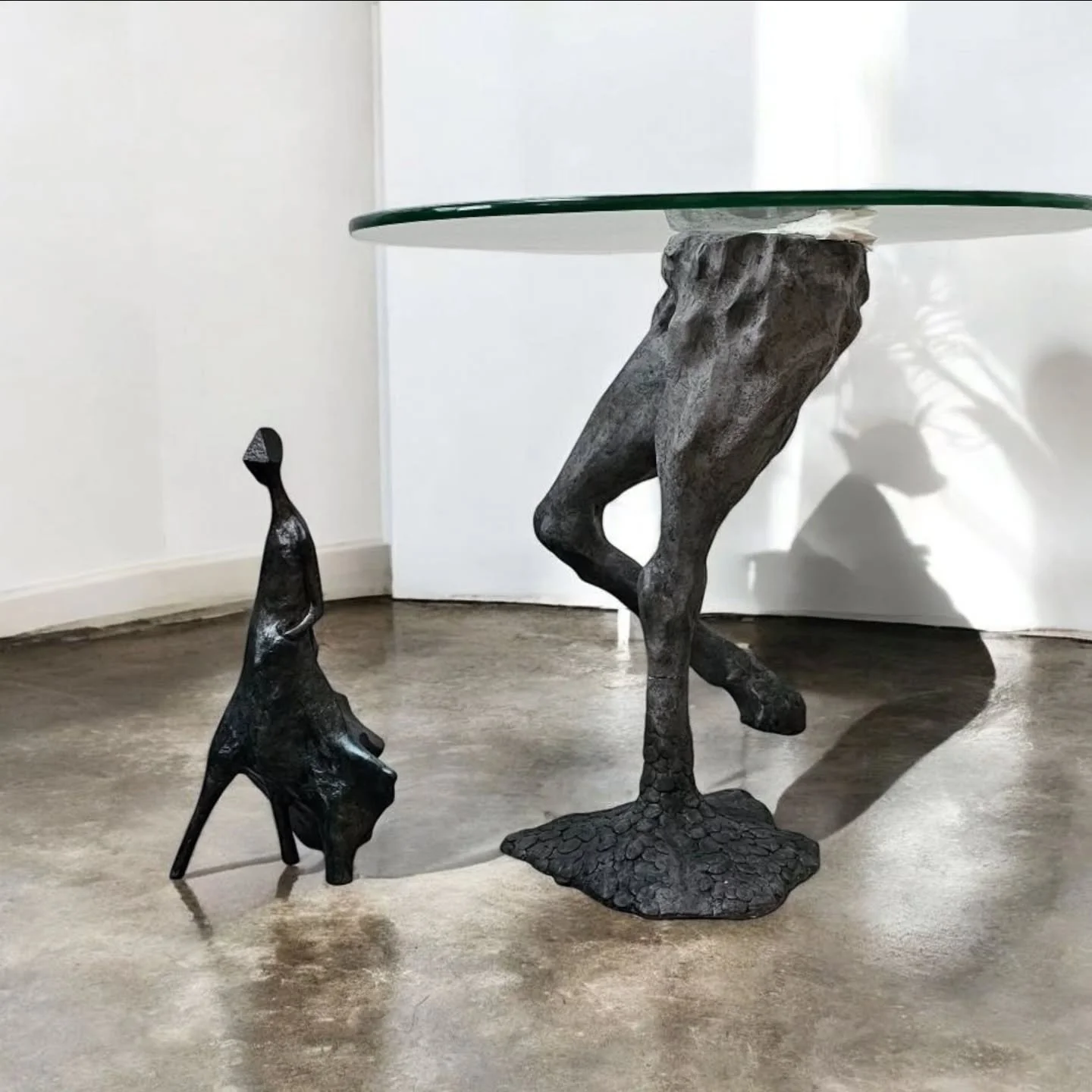 It's a freakin' side table, but not just any side table. You got a shepherd, yeah, leading some mythical, leggy beast like it&rsquo;s straight outta a weird dream. It&rsquo;s functional, it&rsquo;s sculptural, it&rsquo;s got story! You put your drink