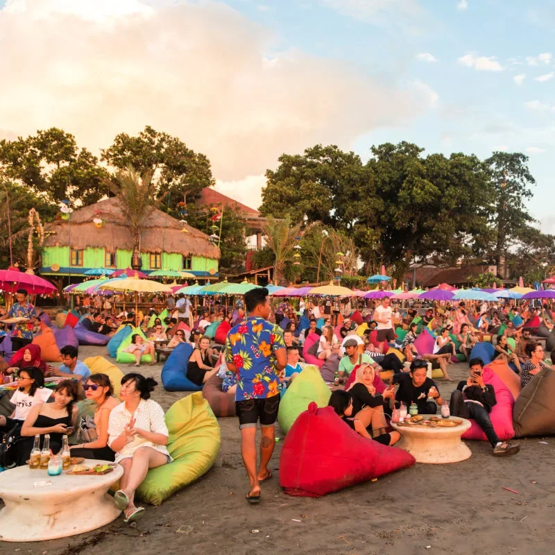 Hundreds-Of-Tourists-On-Bali-Beach-In-Kuta-At-Sunset.jpg.webp