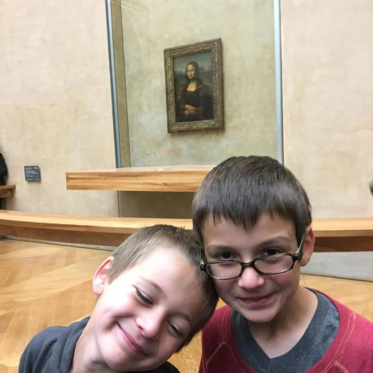 France - my kids with Mona Lisa 