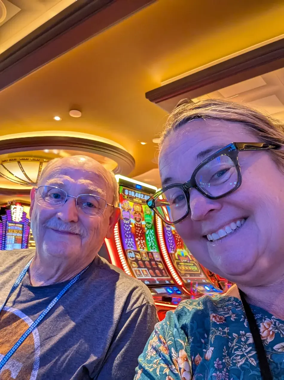 Julie from No Point Left Behind with her dad in the Casino on Princess Cruises