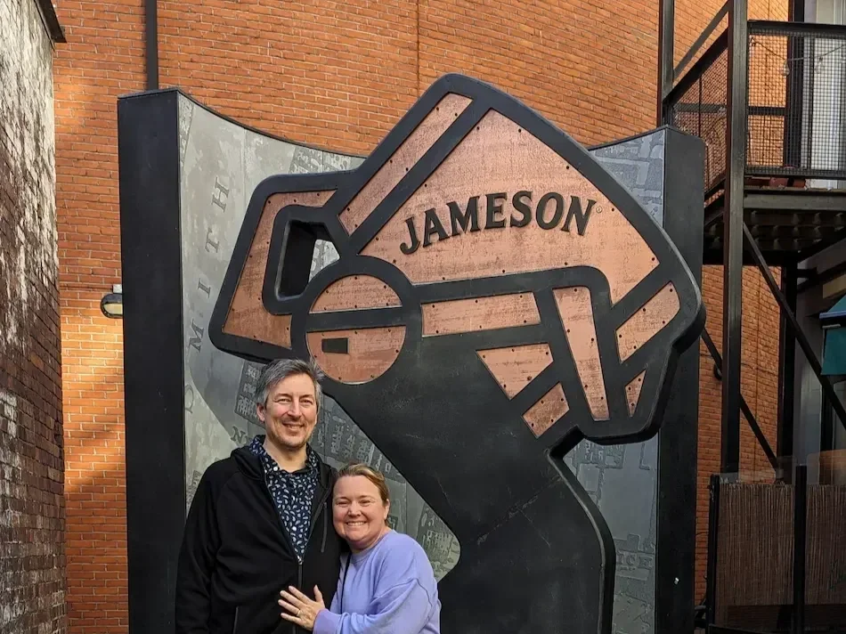 Julie and Brandon in front of James on Whiskey in Nashville