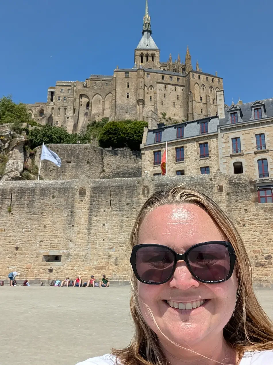Mont St Michel - the author Julie no point left behind