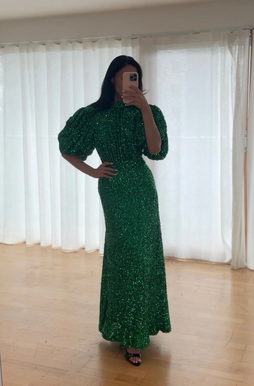 Model wearing ROTATE green sequin dress