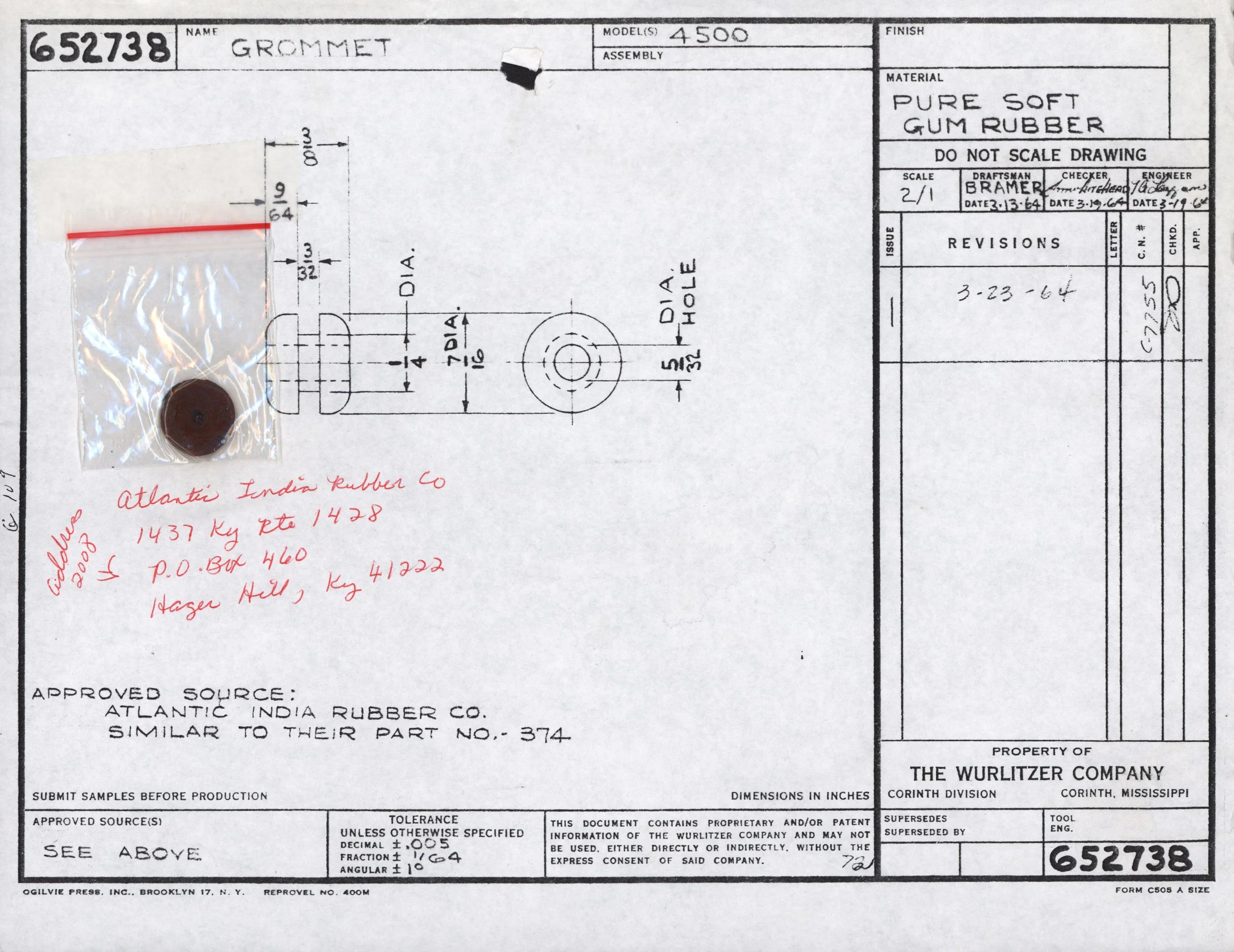 Technical drawing document of a grommet, including measurements and material specifications, with a small sealed plastic bag containing a rubber grommet attached to it.