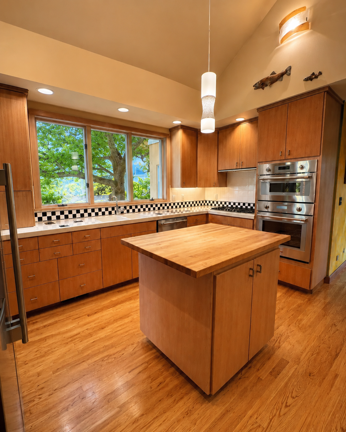 Refinished kitchen cabinets completed by Salazar Custom Finish in West Linn, OR 