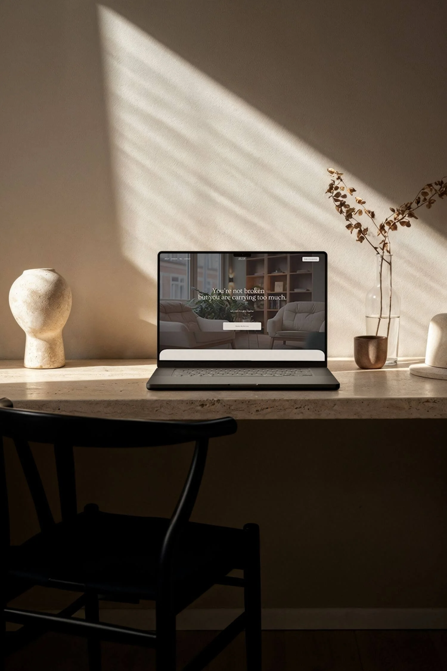 Desktop view of a minimalist therapist website template with warm, calming design, created for private practice websites on Squarespace.