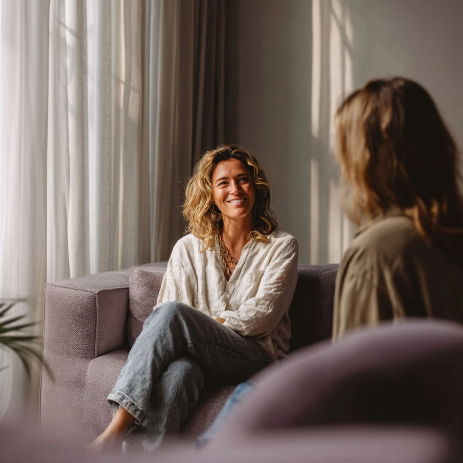 Therapist in a calm, professional session setting reflecting trust and emotional safety in a private practice