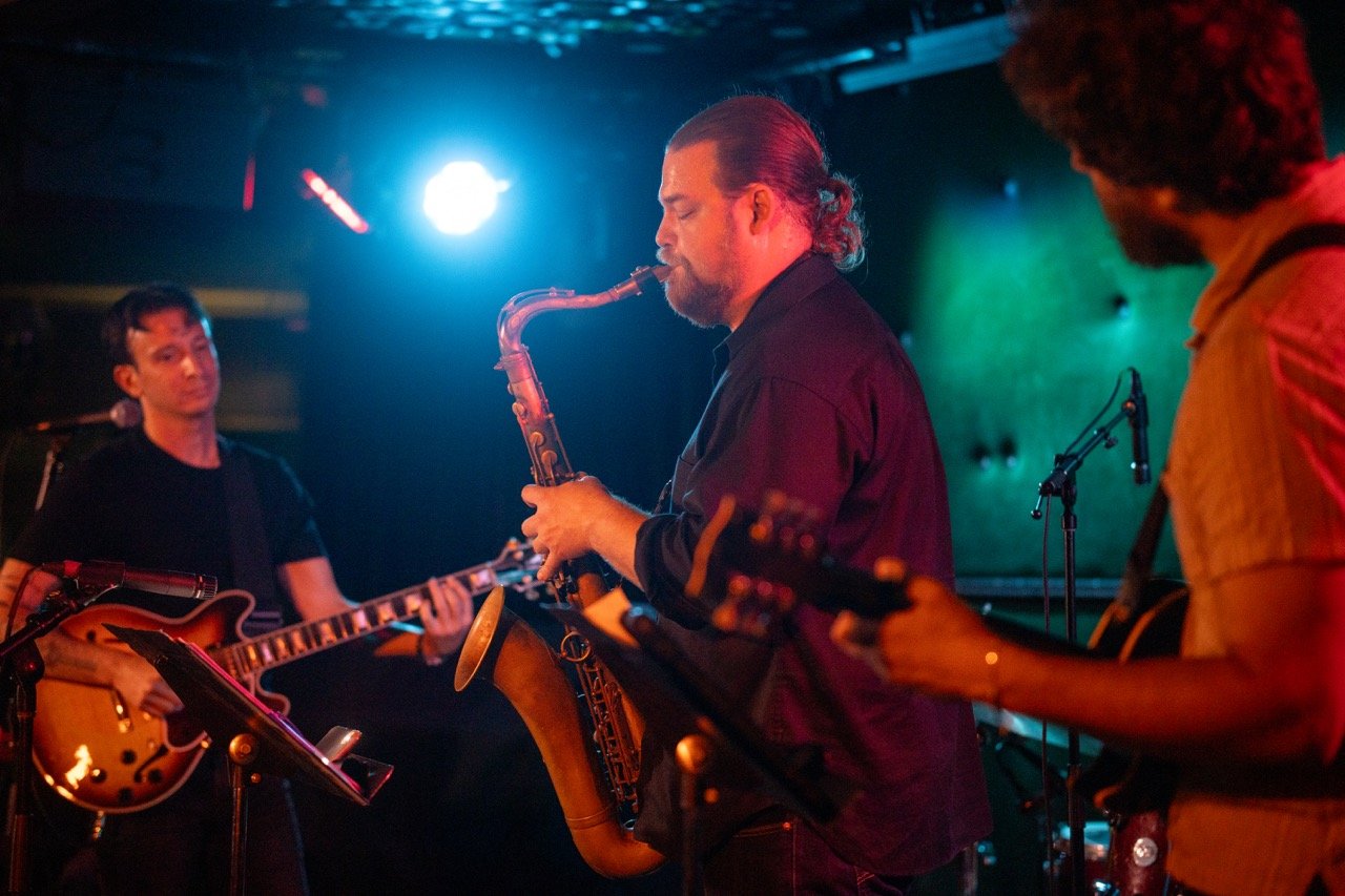Jazz-fusion band onstage.