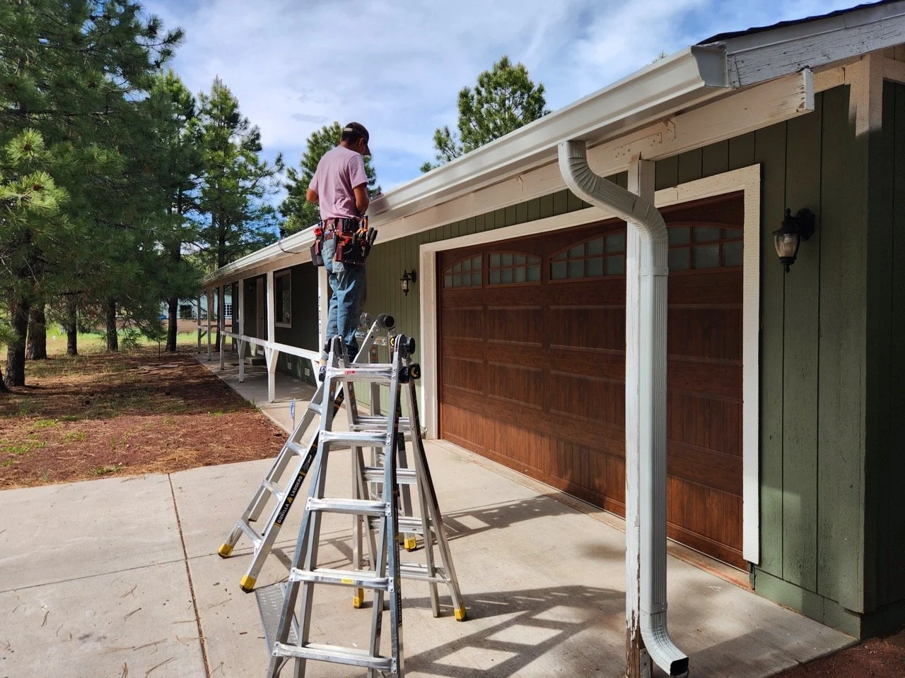 Guardian Gutters team completing custom gutter installation in Northern Arizona with greate Care