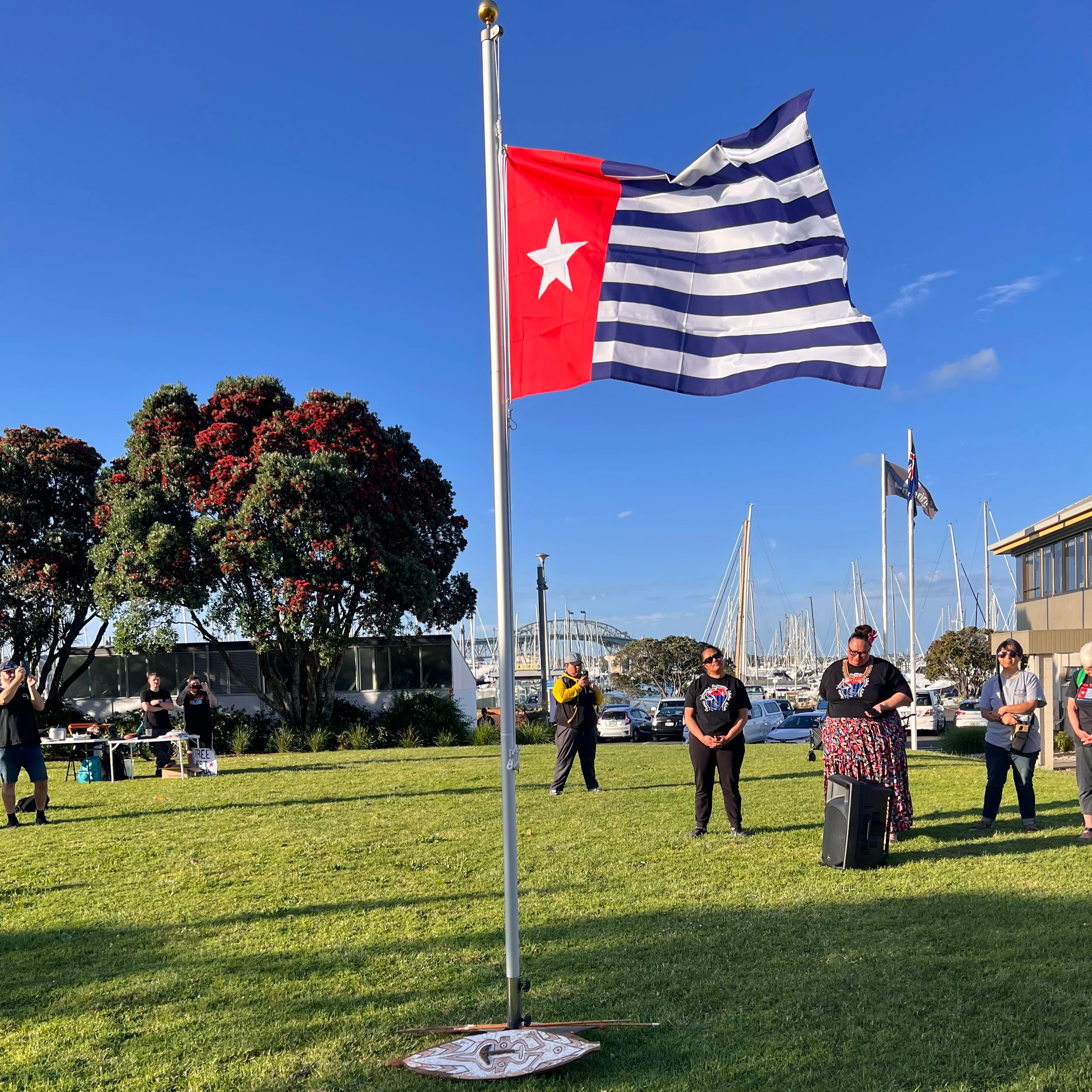 West Papua flag rising