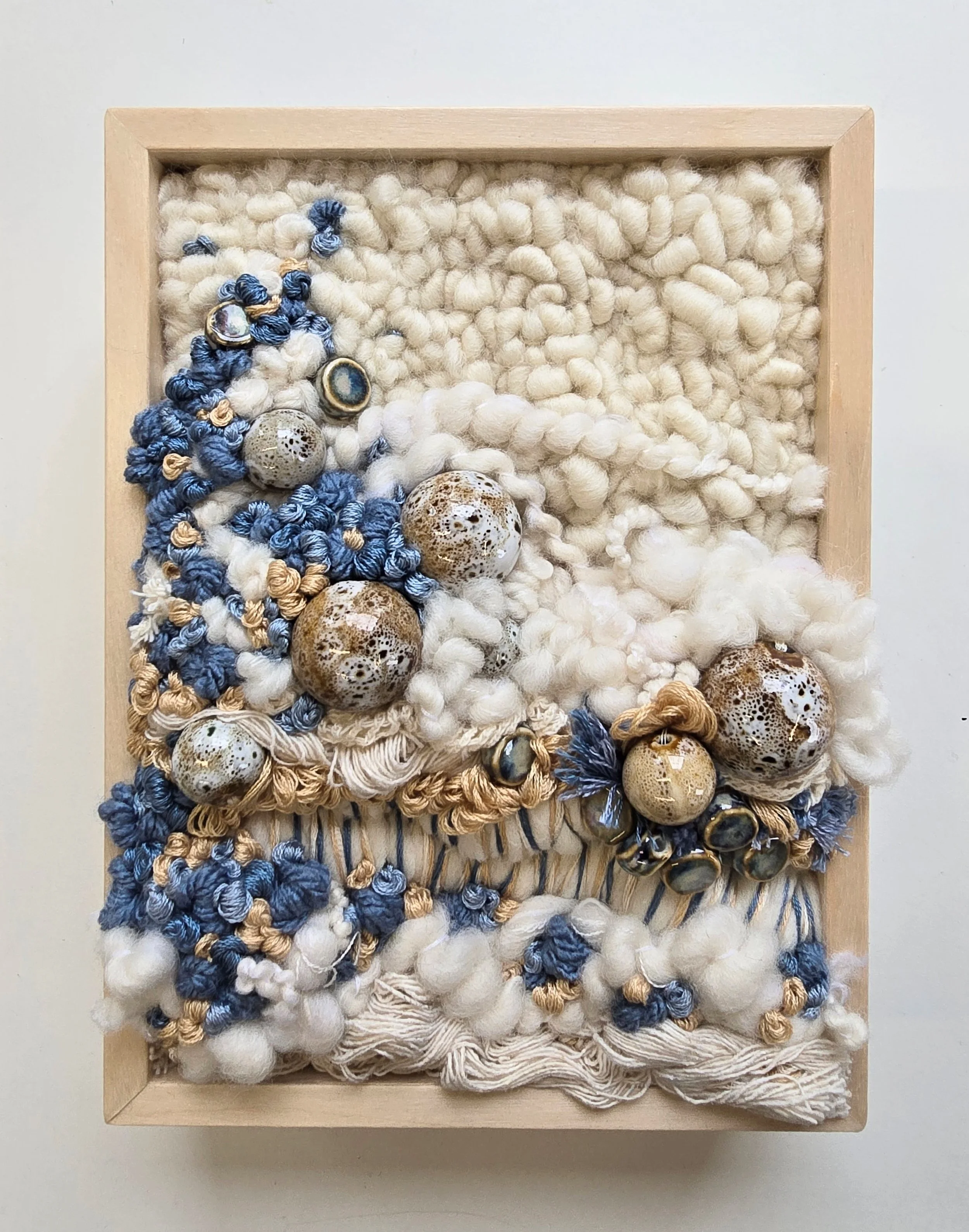Beach Music | Hooked wool and mixed yarns, handspun art yarn, cotton rope & textiles, embroidery, & ceramic beading in a solid birch frame with natural finish |
6” x 8” x 2” | SOLD
