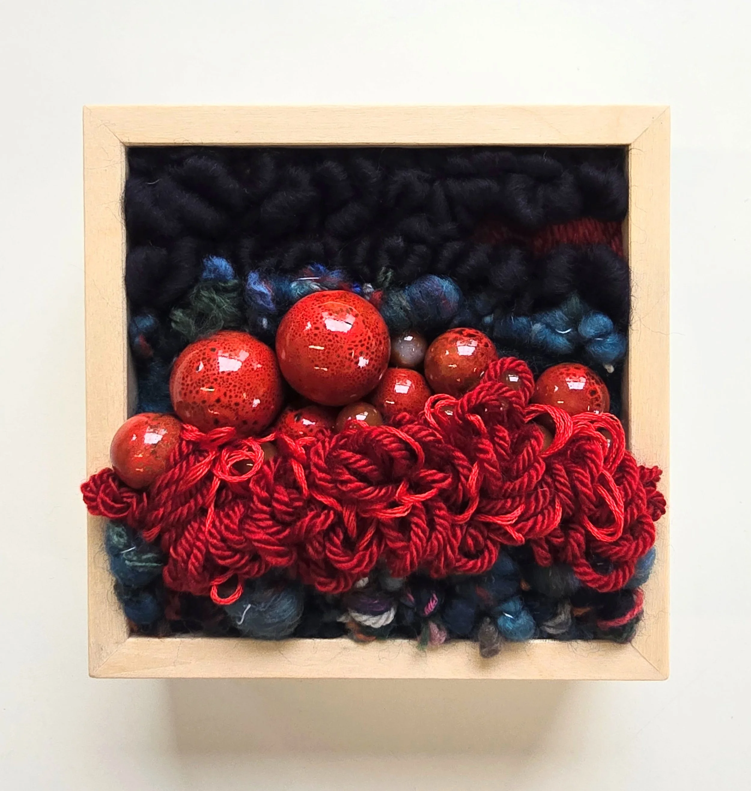 Smooth Operator | Hooked wool and mixed yarns, handspun art yarn, & ceramic beading in a solid birch frame with natural finish | 5” x 5” x 2” | $125
