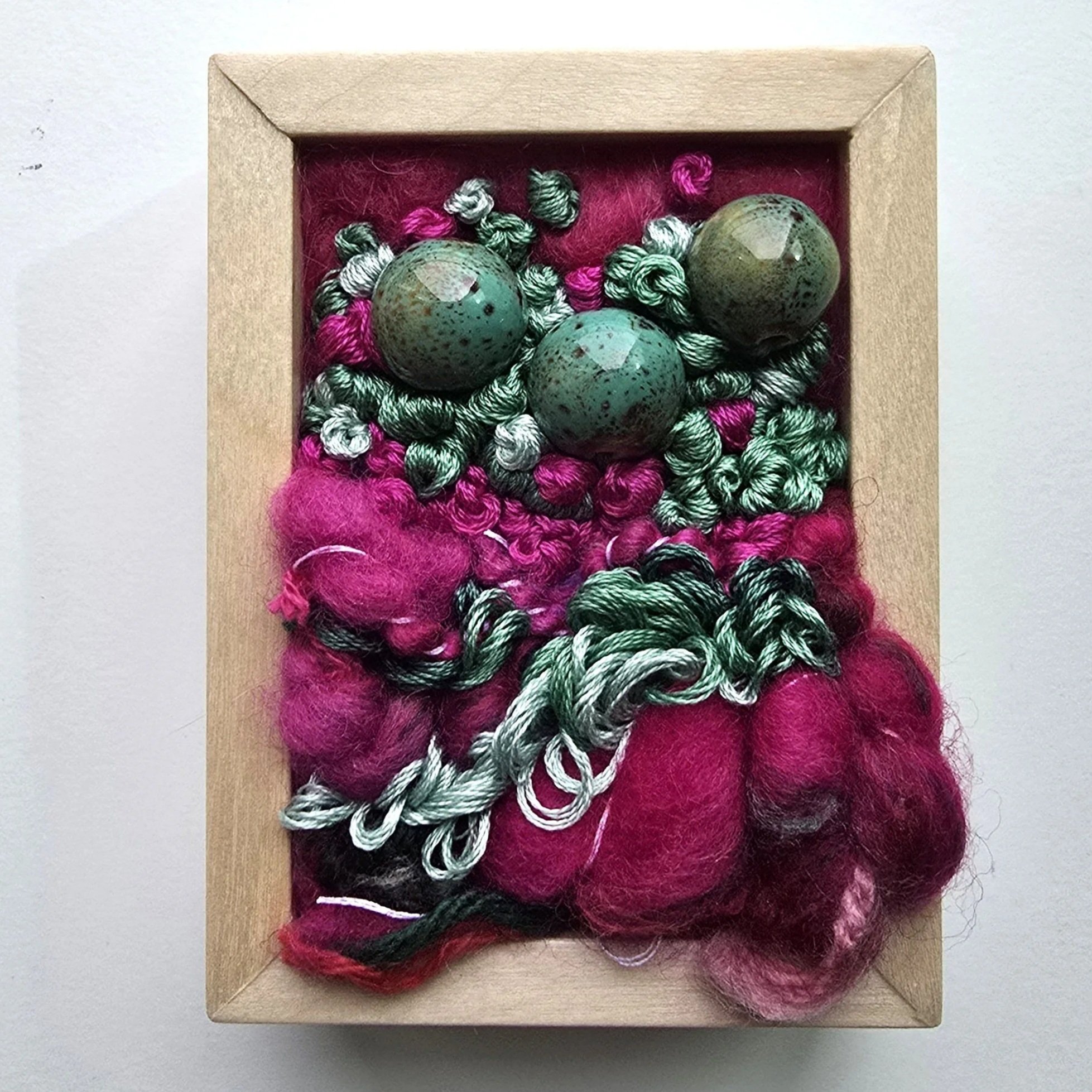 Mini 12 | Needle felted wool, mixed yarns, handspun art yarn, stitching, & ceramic beading in solid birch frame with natural finish | 3" x 4" x 1.5" | $50 (CDN)