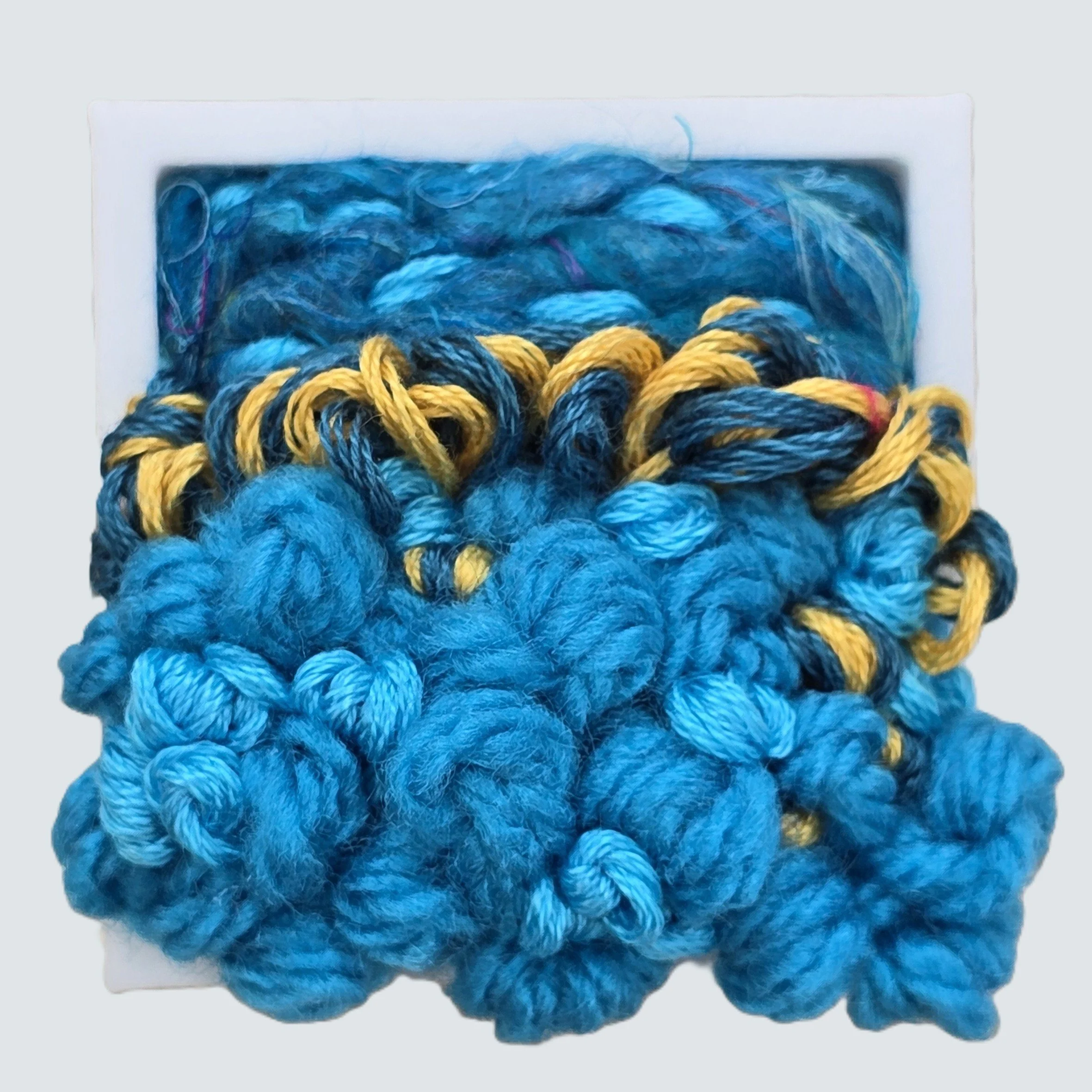 Mini 37 | Needle felted wool & stitching in a white composite frame, includes white plinth | 1.75" x 1.75" x 0.5" | $30