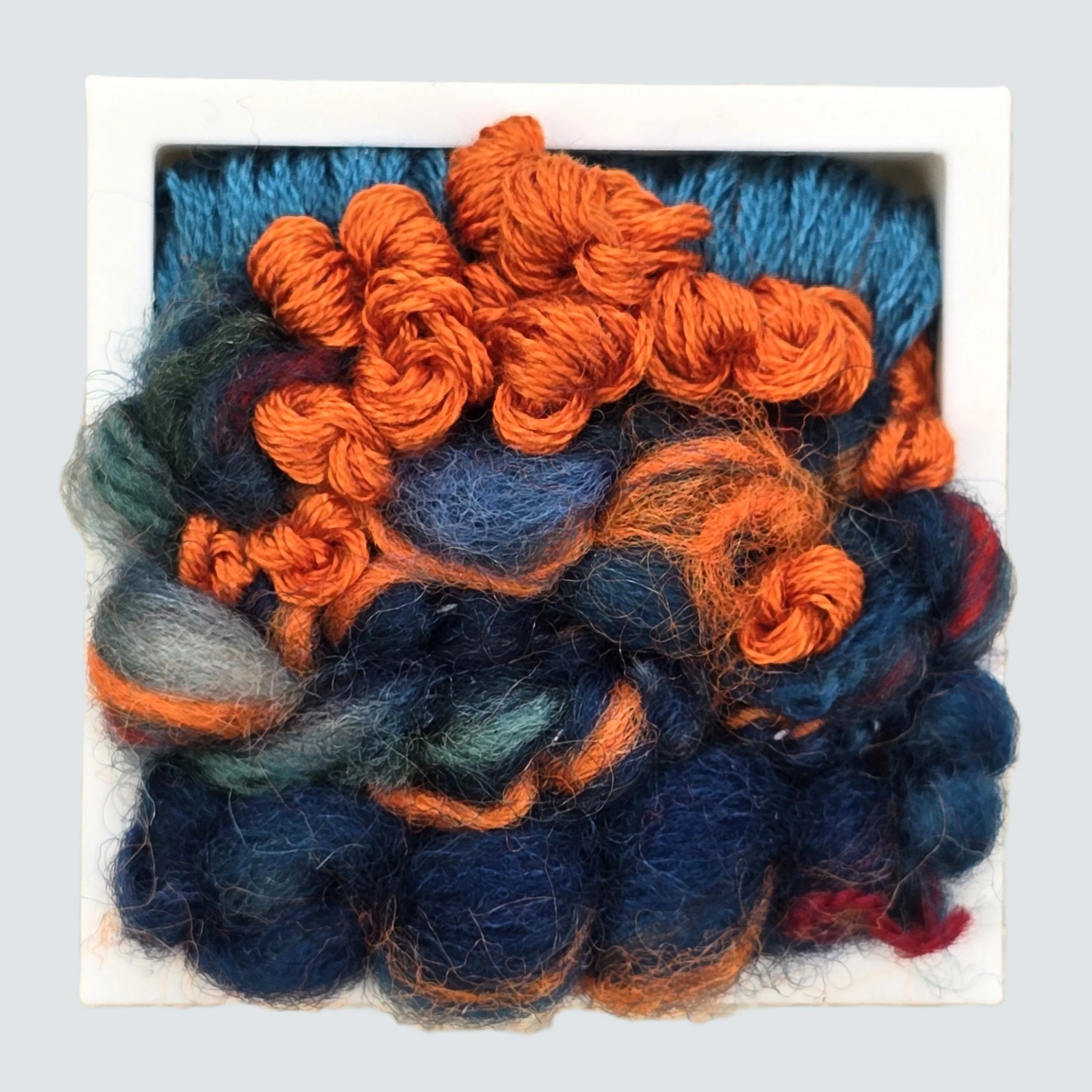 Mini 24 | Needle felted wool & stitching in a white composite frame, includes white plinth | 1.75" x 1.75" x 0.5" | $30