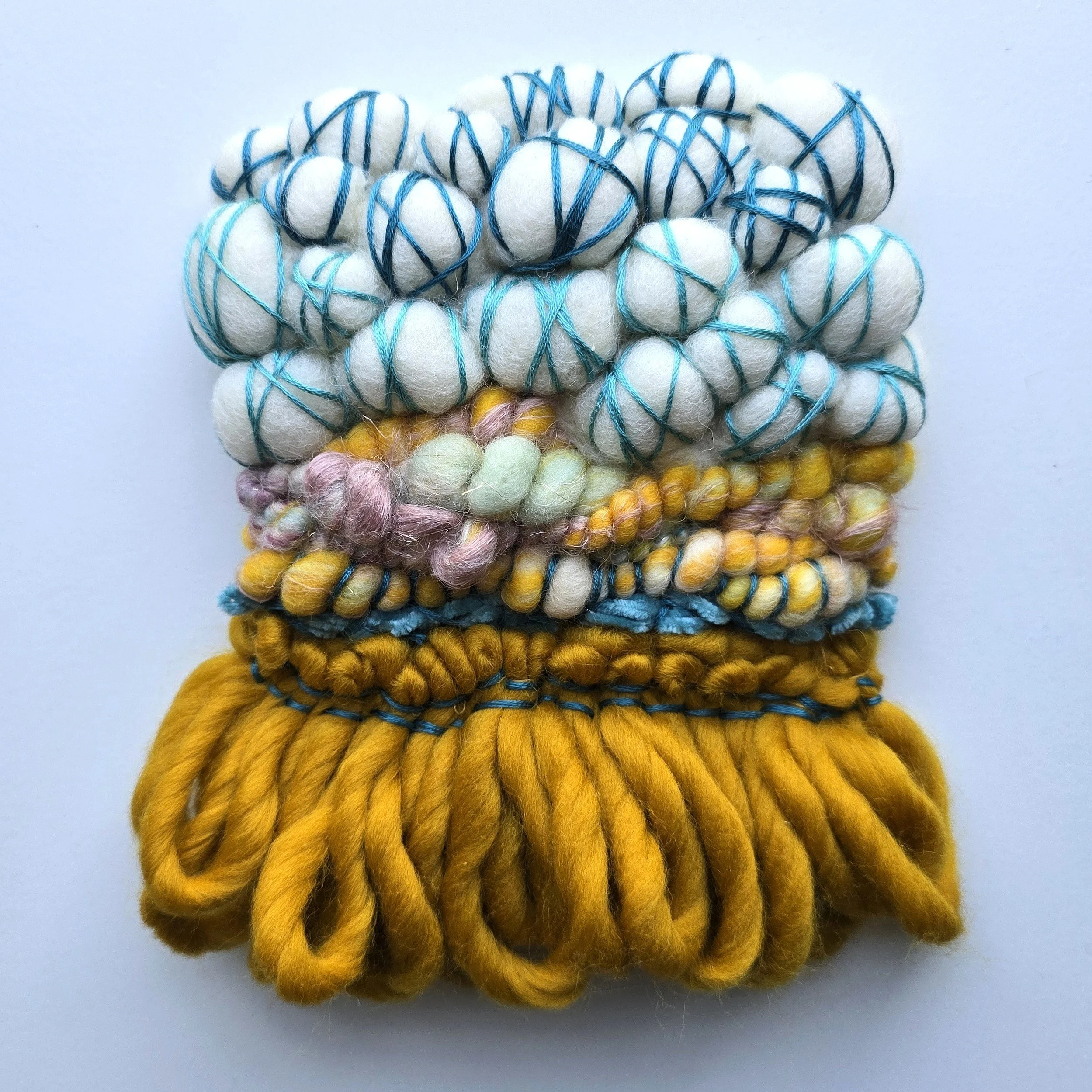 Still Waters Run Deep I | Needle felted wool, hand-spun art yarn, & embroidery, mounted on board & ready to hang | 6" x 7" | $35 (CDN) - SOLD