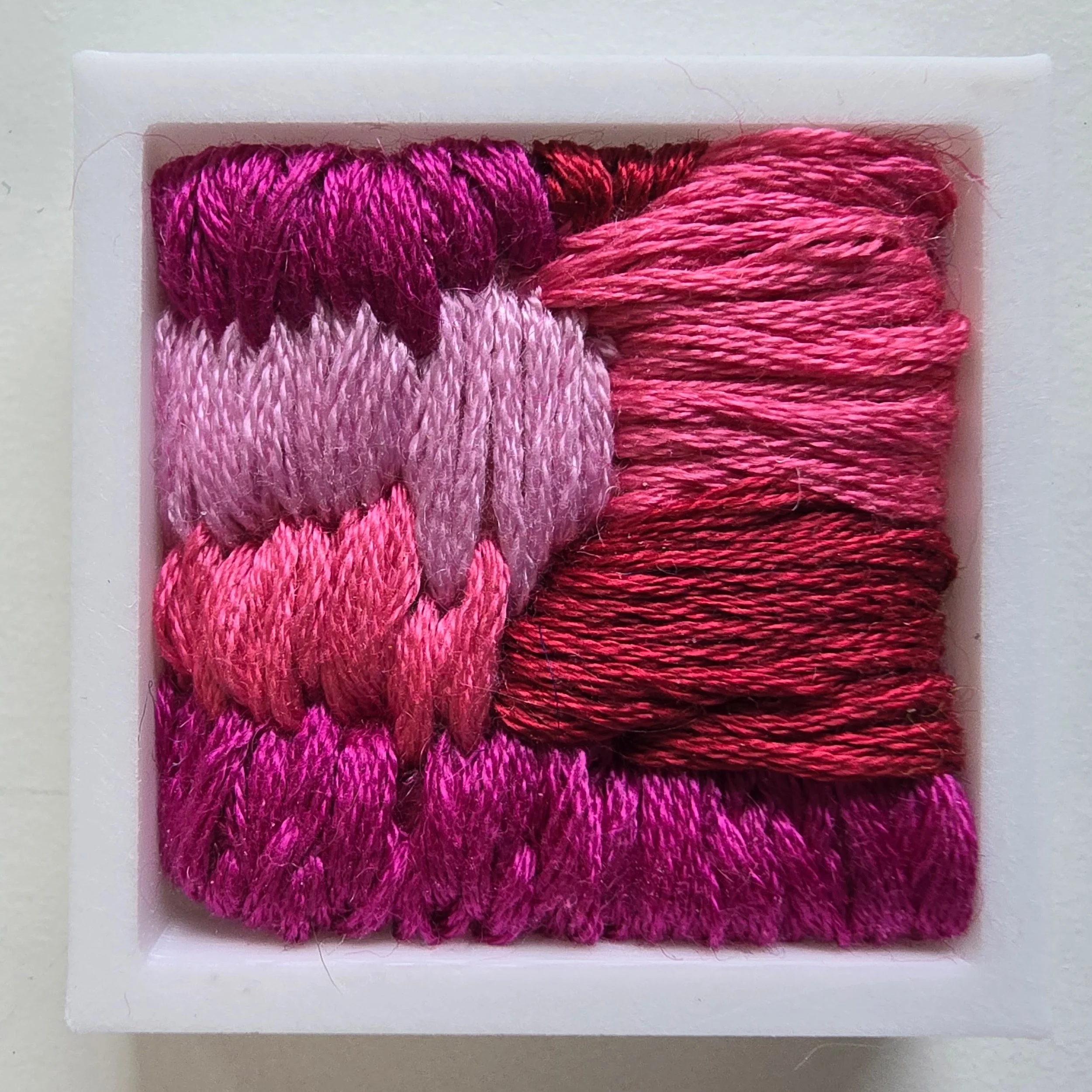 Mini 2 | Needle felted wool & stitching in a white composite frame | 1.75" x 1.75" x 0.5" | $30 (CDN) ***Available at Tiny Ass Art Gallery, St. Jacobs, Ontario in May 2026
