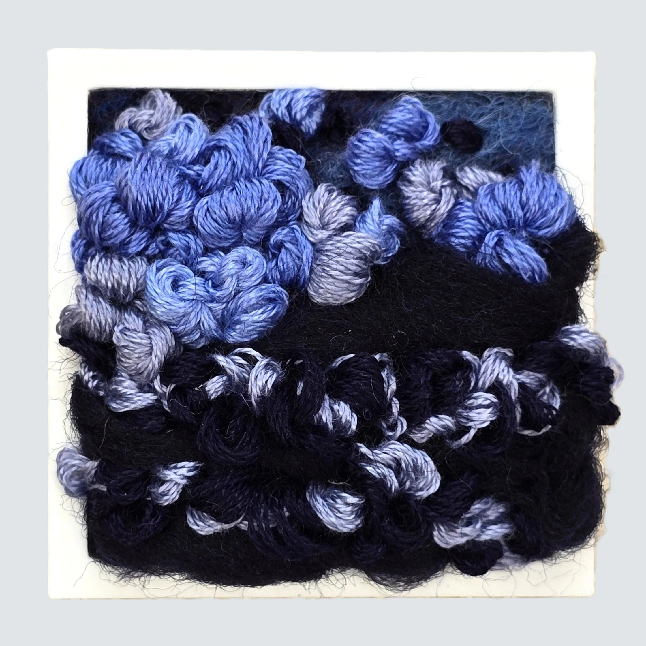 Mini 29 | Needle felted wool & stitching in a white composite frame, includes white plinth | 1.75" x 1.75" x 0.5" | $30