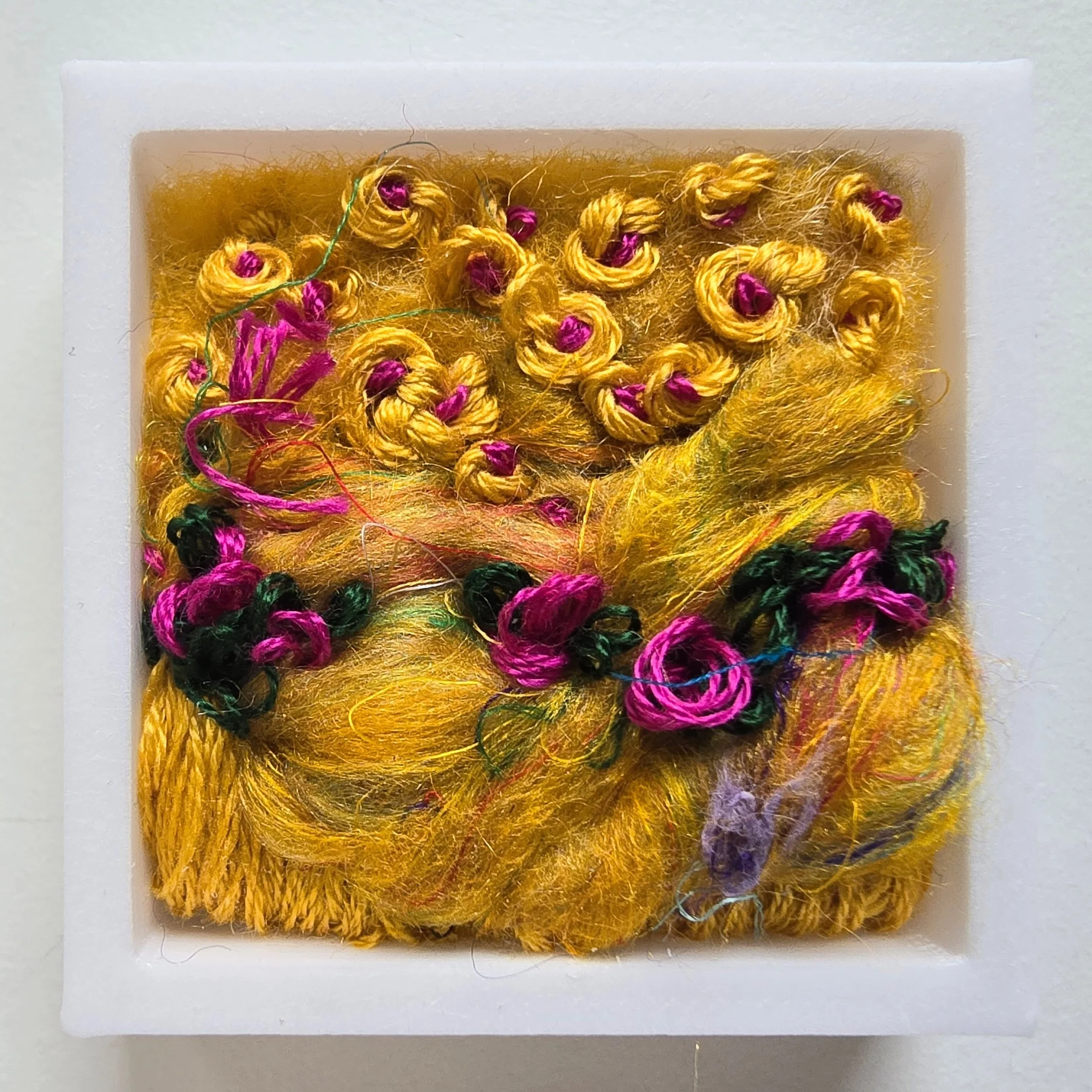 Mini 8 | Needle felted wool, silk roving, & stitching in a white composite frame | 1.75" x 1.75" x 0.5" | $30 (CDN) ***Available at Tiny Ass Art Gallery, St. Jacobs, Ontario in May 2026