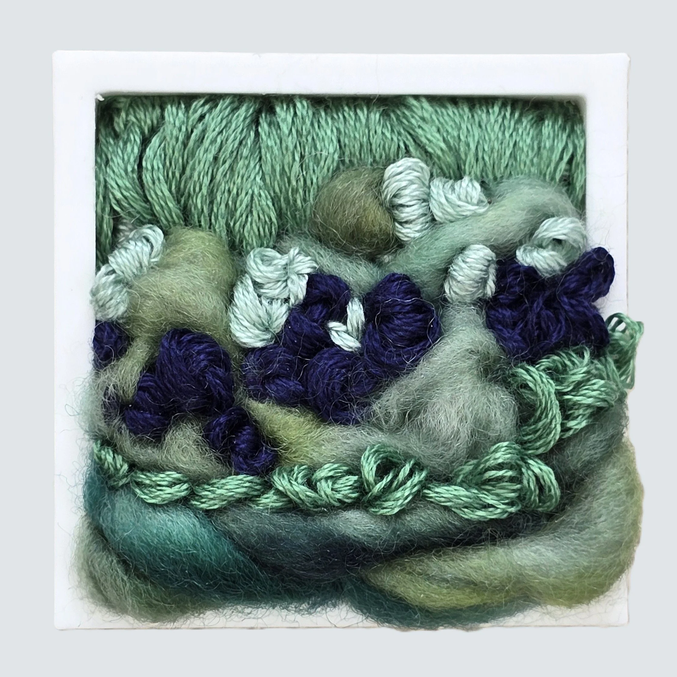 Mini 34 | Needle felted wool & stitching in a white composite frame, includes white plinth | 1.75" x 1.75" x 0.5" | $30
