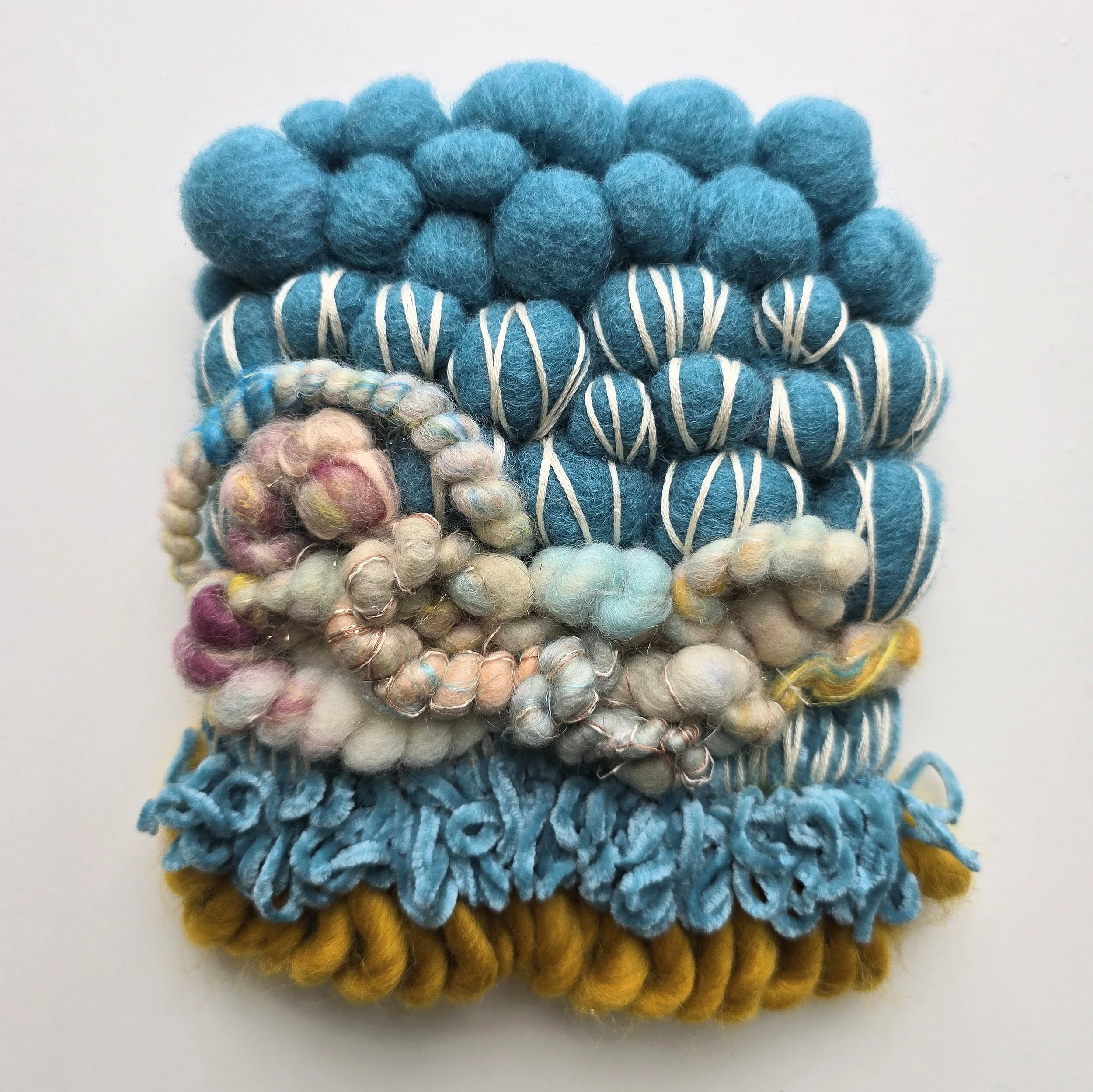 Still Waters Run Deep II | Needle felted wool, hand-spun art yarn, chenille, & embroidery, mounted on board & ready to hang | 6" x 7" | $35 (CDN) - SOLD