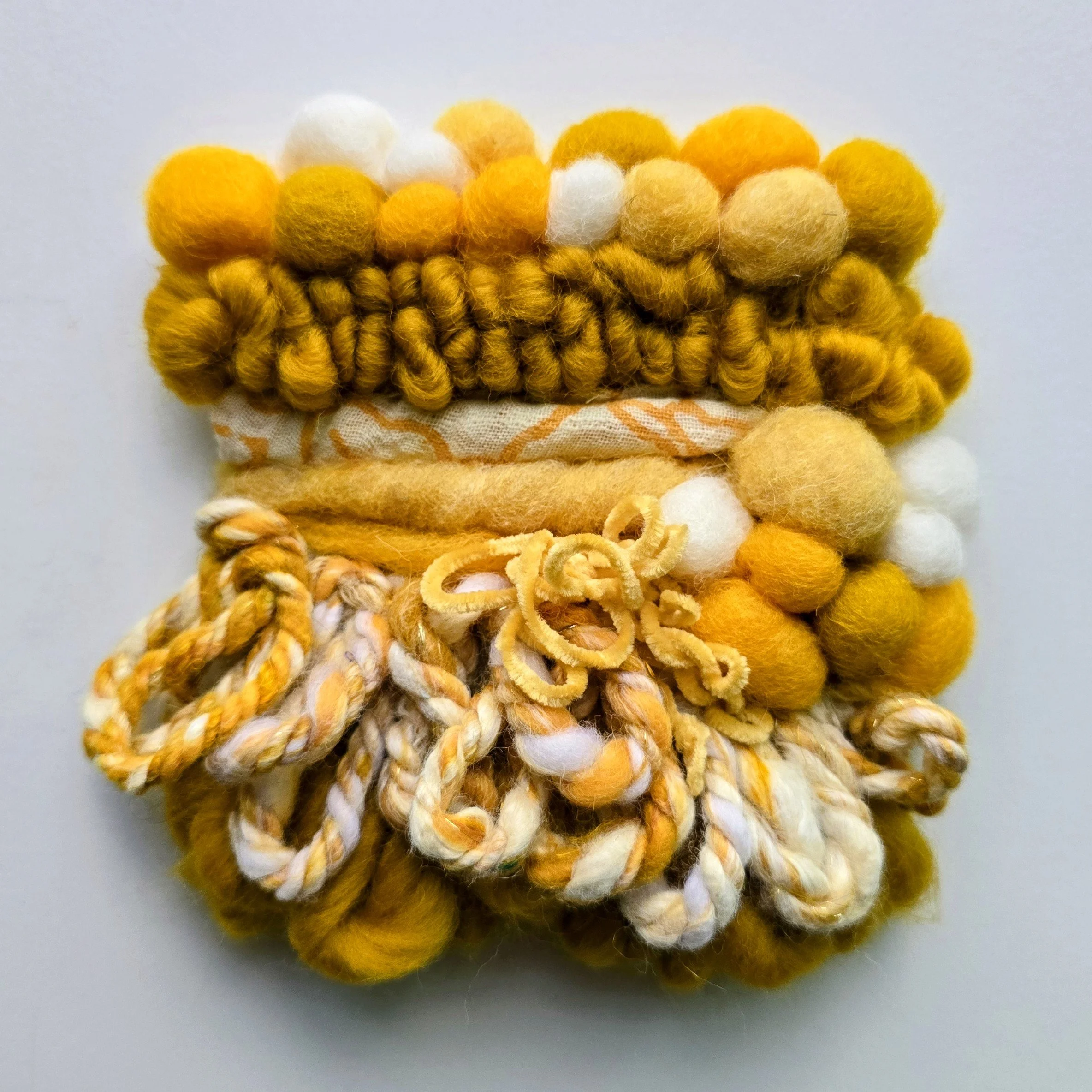Goldenrod | Needle felted wool, hand-spun art yarn, & embroidery, mounted on board & ready to hang | 4" x 4" | $25 (CDN) - SOLD