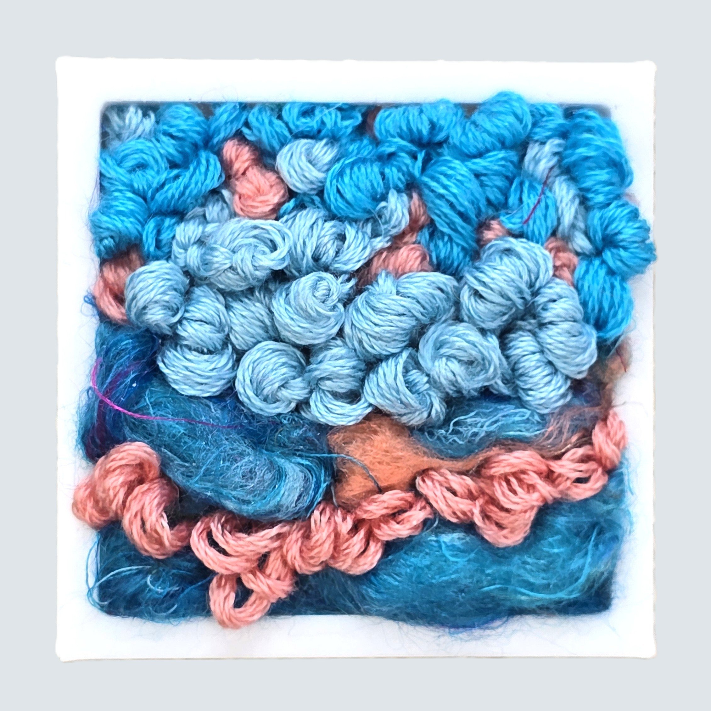 Mini 30 | Needle felted wool & stitching in a white composite frame, includes white plinth | 1.75" x 1.75" x 0.5" | $30
