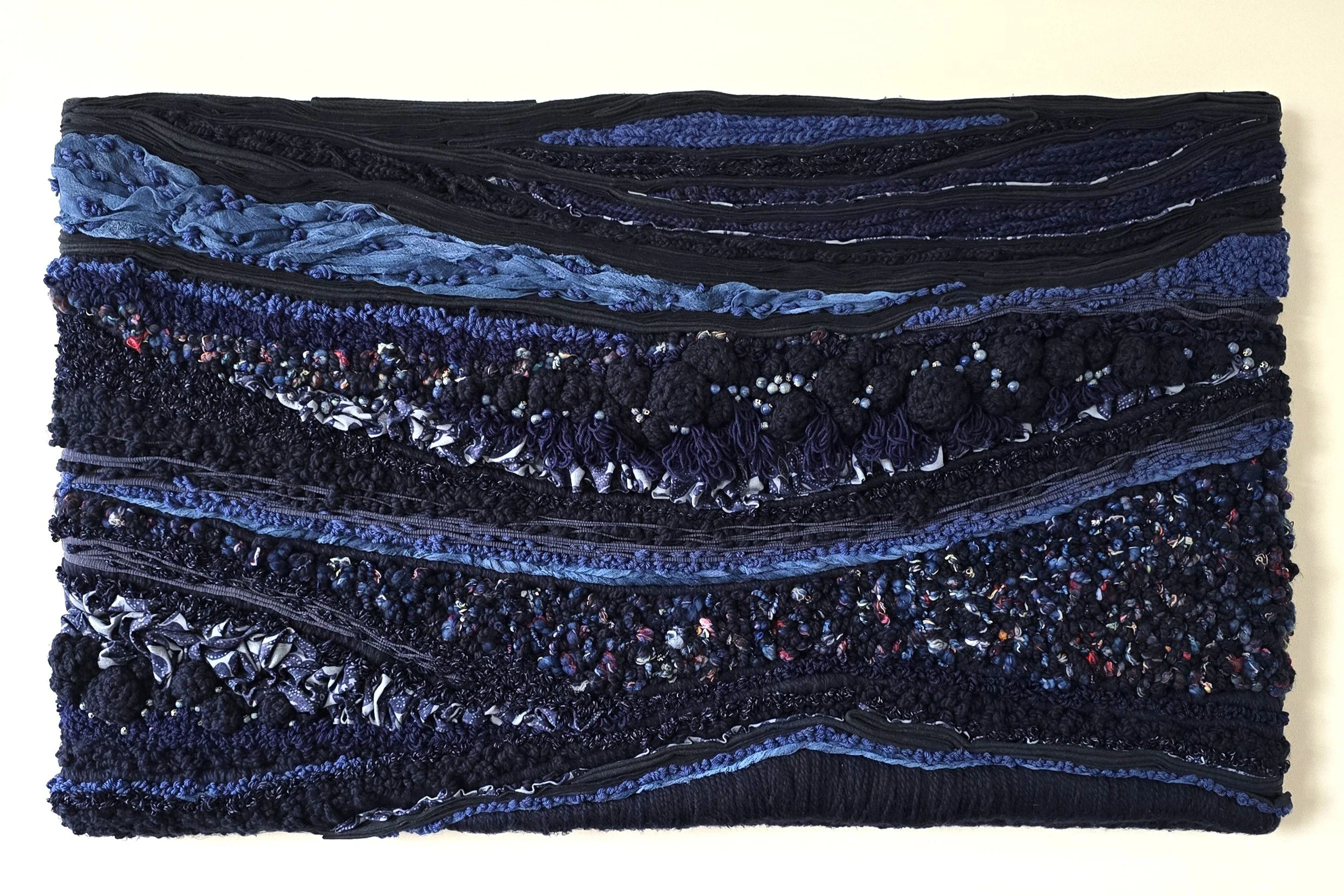 Moonlight, Solitude & All The Possibilities | Mixed textiles, handspun art yarn, stitched & crocheted yarns, & ceramic beading, mounted on board & wired for hanging | 33" x 55" x 2" | $7000 (CDN)