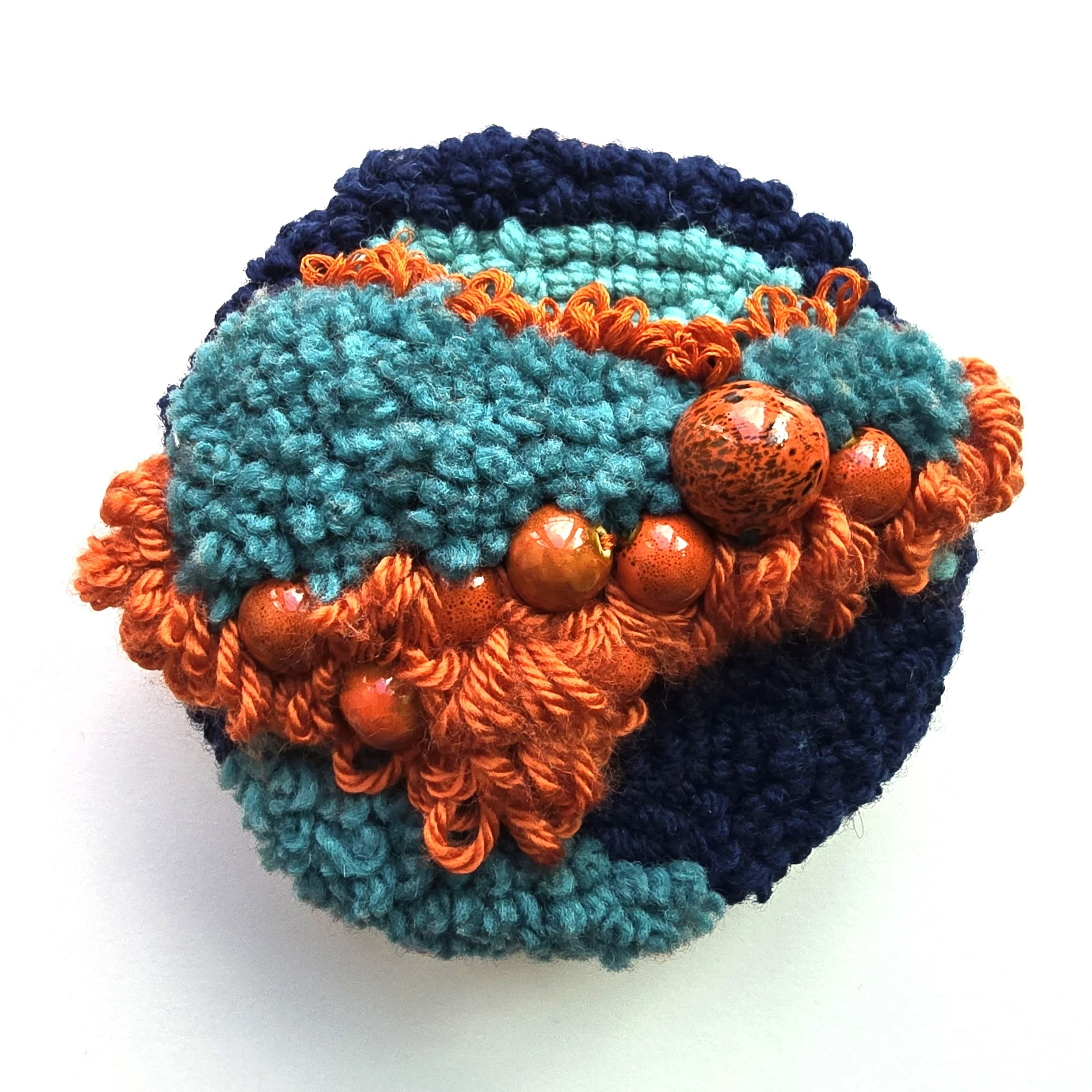 Better Days | Stitched, hooked, & punch needled mixed yarns, cotton thread, and ceramic beading mounted on board & wired for hanging | 6" diameter x 2" deep | $125