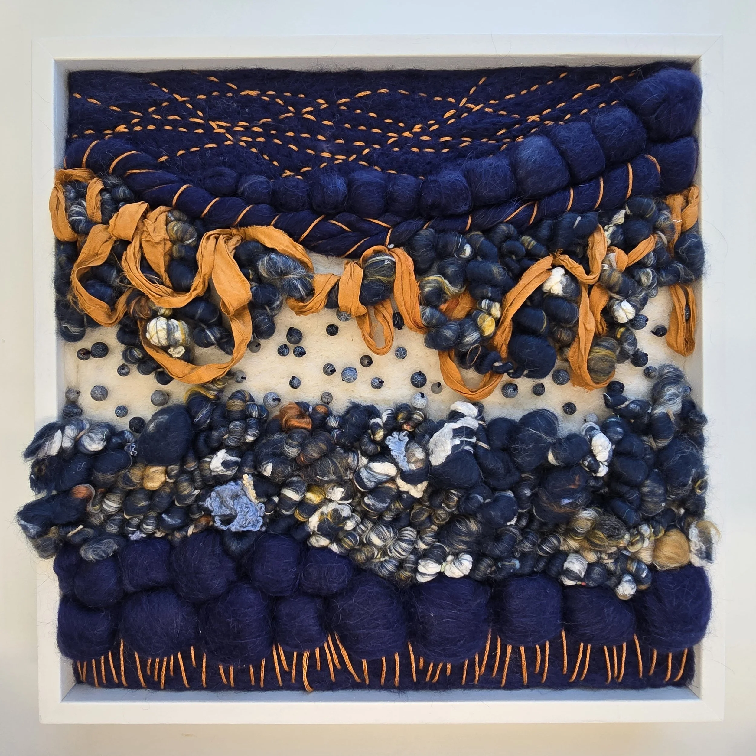After Midnight | Needle felted wool, handspun yarn, recycled sari silk, agate beading, & embroidery, solid oak frame with white painted finish | 13" x 13" x 2" | $450 (CDN) 