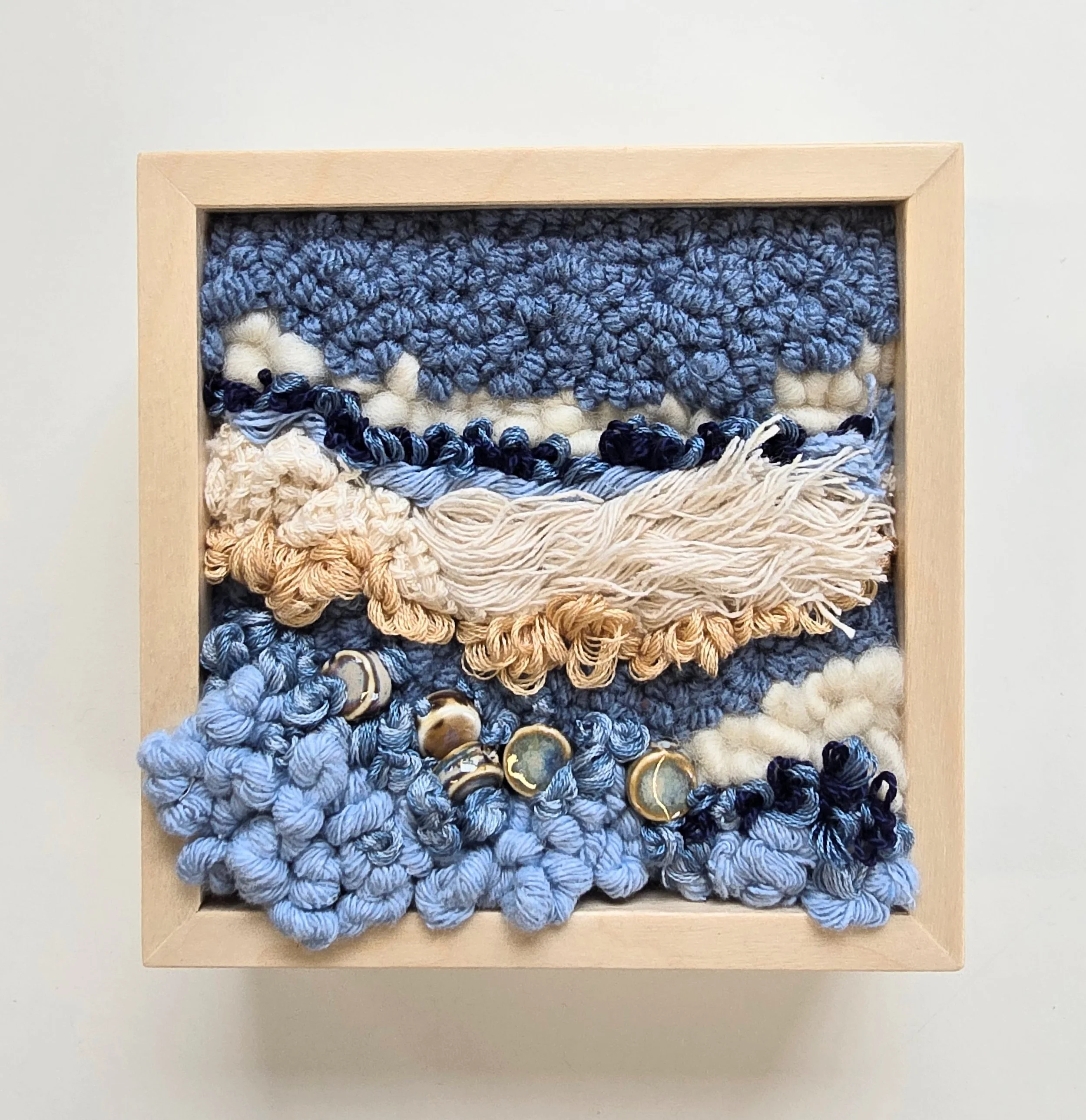 Drift Away | Punch needled & hooked wool, cotton rope & textiles, embroidery, and ceramic beading in a solid birch frame with natural finish | 5” x 5” x 2” | SOLD
