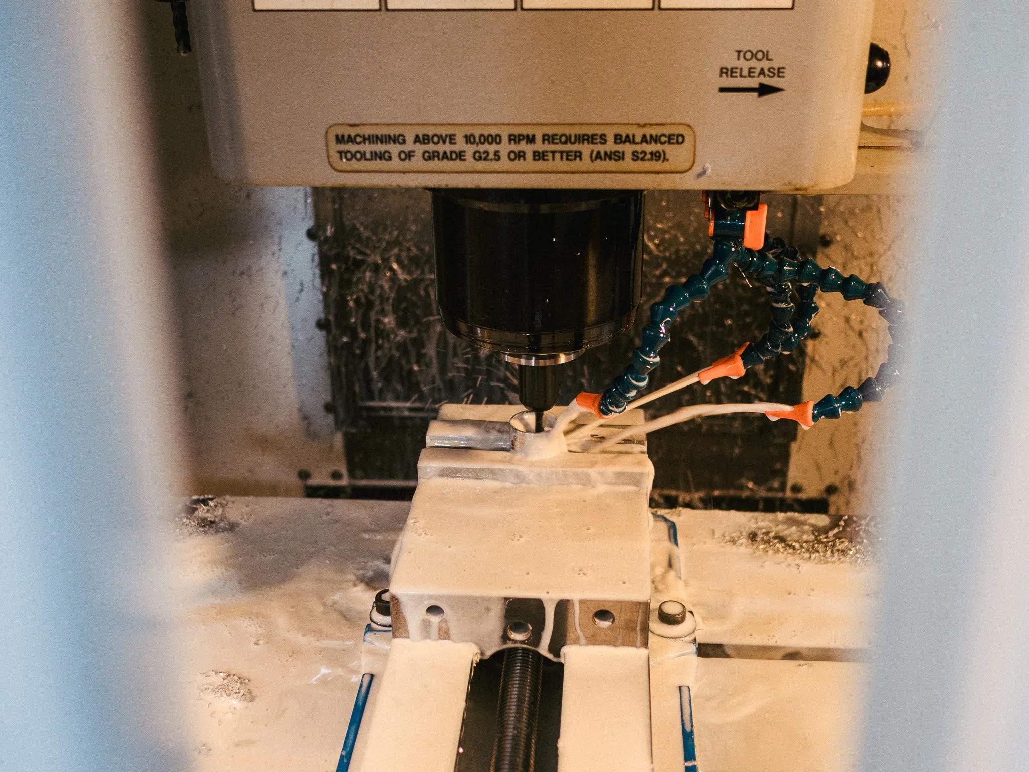 Precision CNC machining Los Angeles aerospace and medical aluminum parts on a Haas VF-2 mill