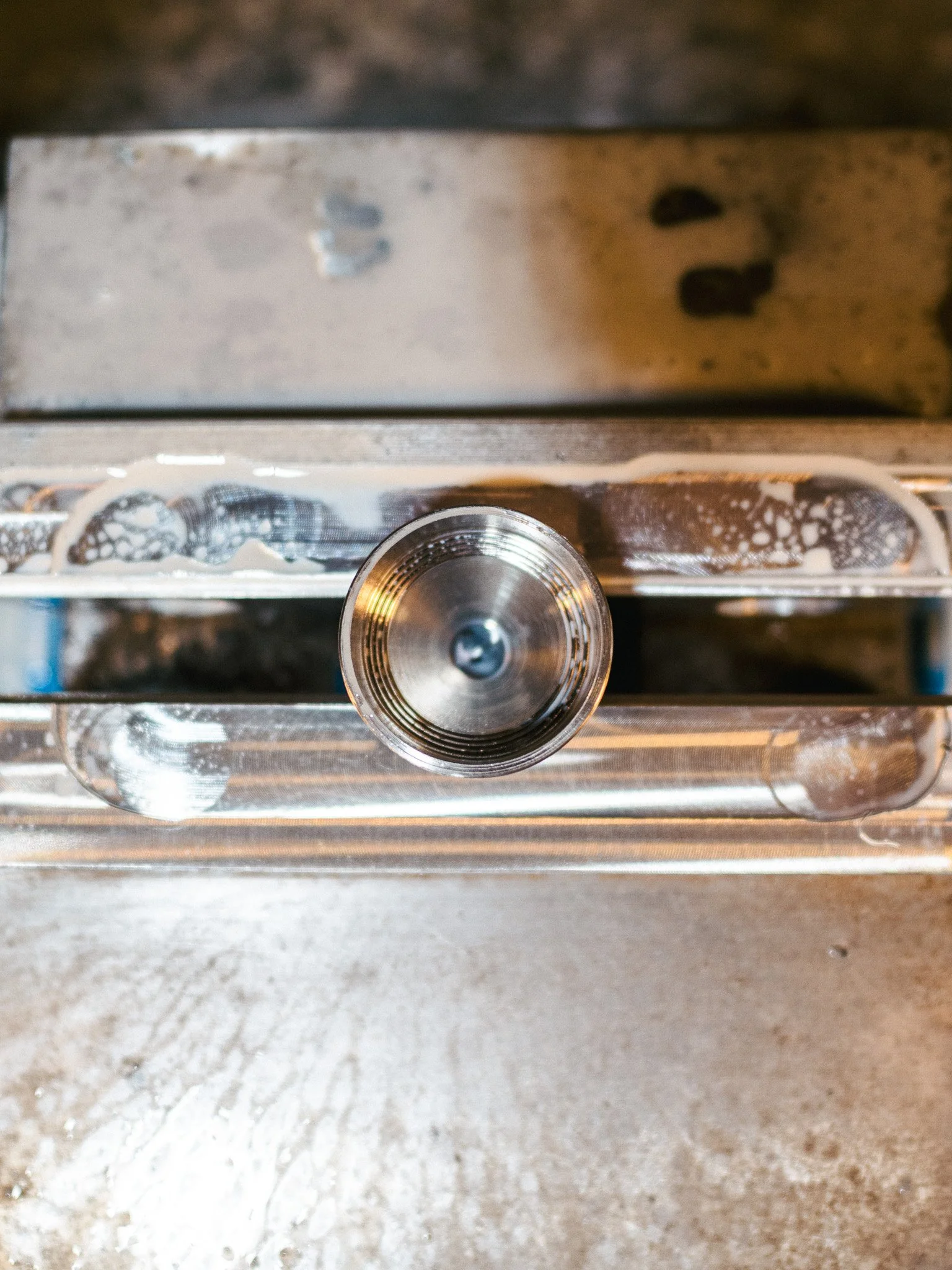 Custom aluminum bracket machined for machinery and automation systems, produced with tight tolerances and smooth finish.