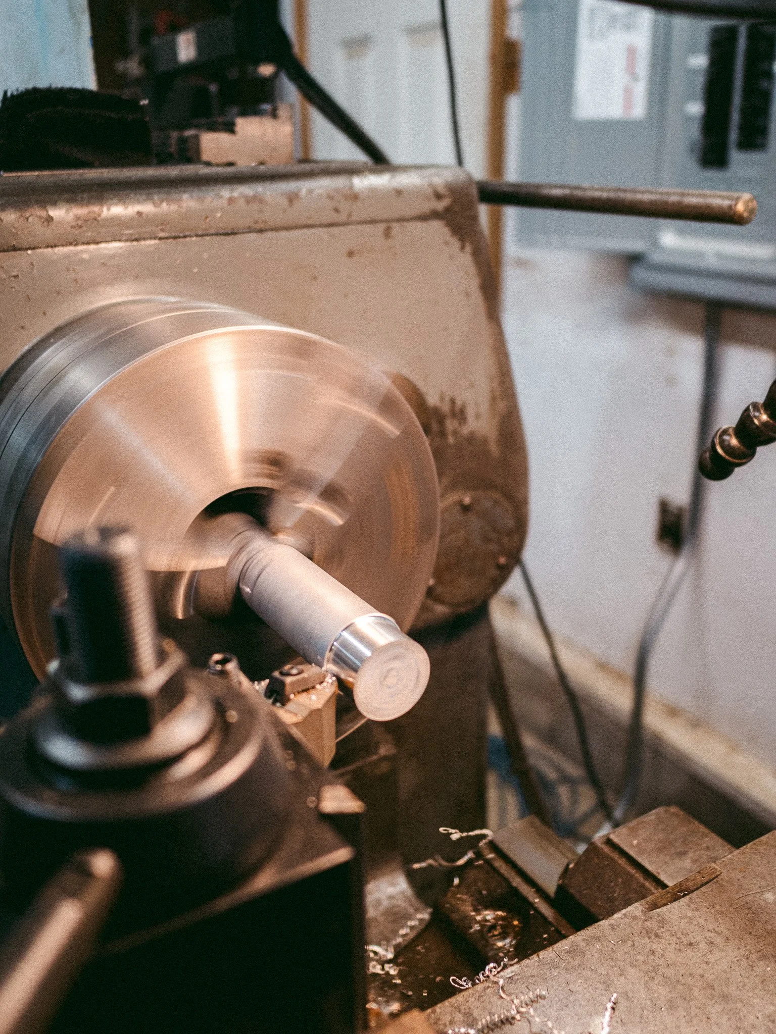 Machined aluminum bushing produced on CNC lathe with tight diameter tolerances – McCarty Fabrication turning