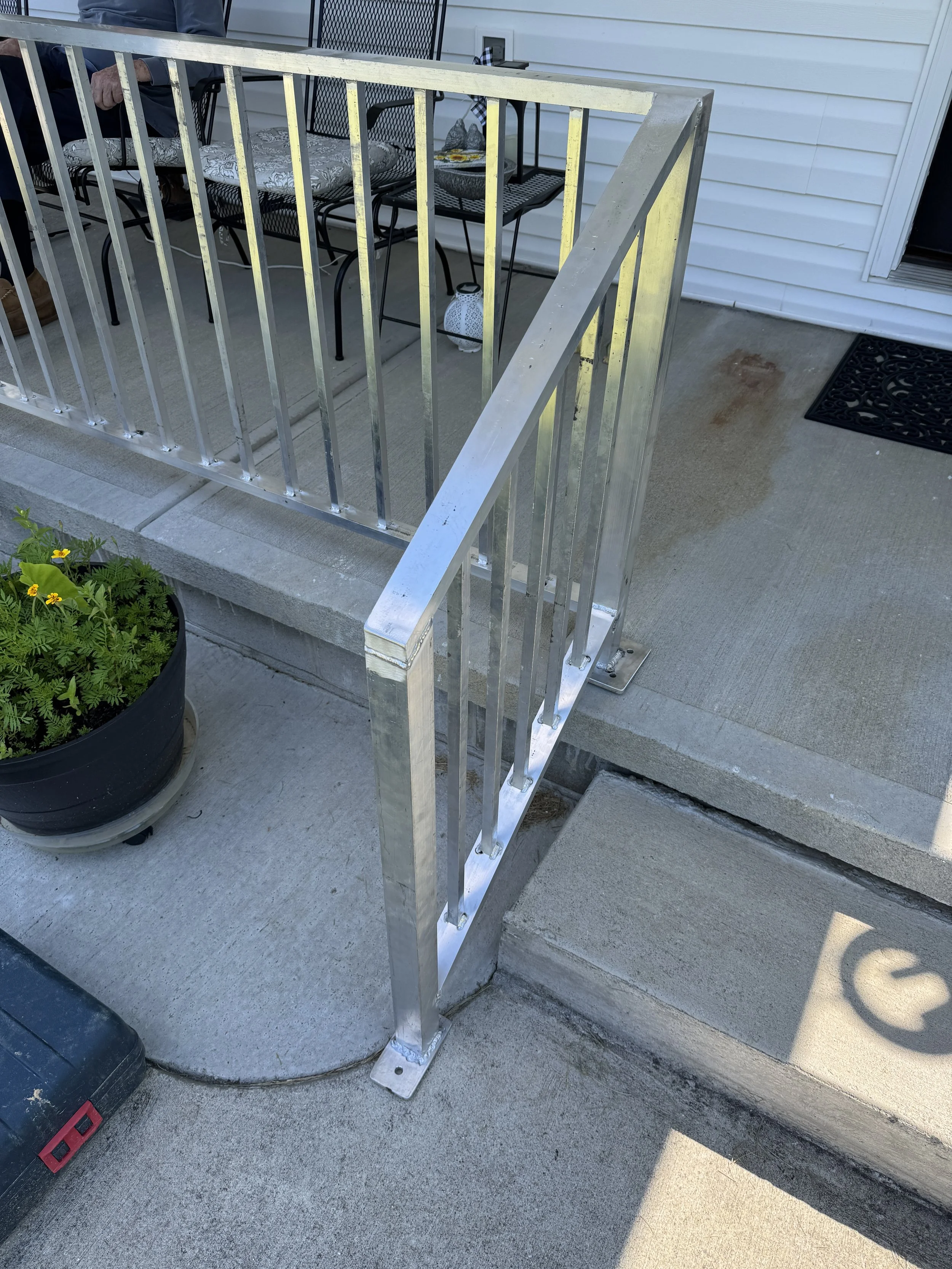 Custom aluminum handrail fabricated and TIG welded by McCarty Fabrication for a residential and commercial project in Corbin, Kentucky.