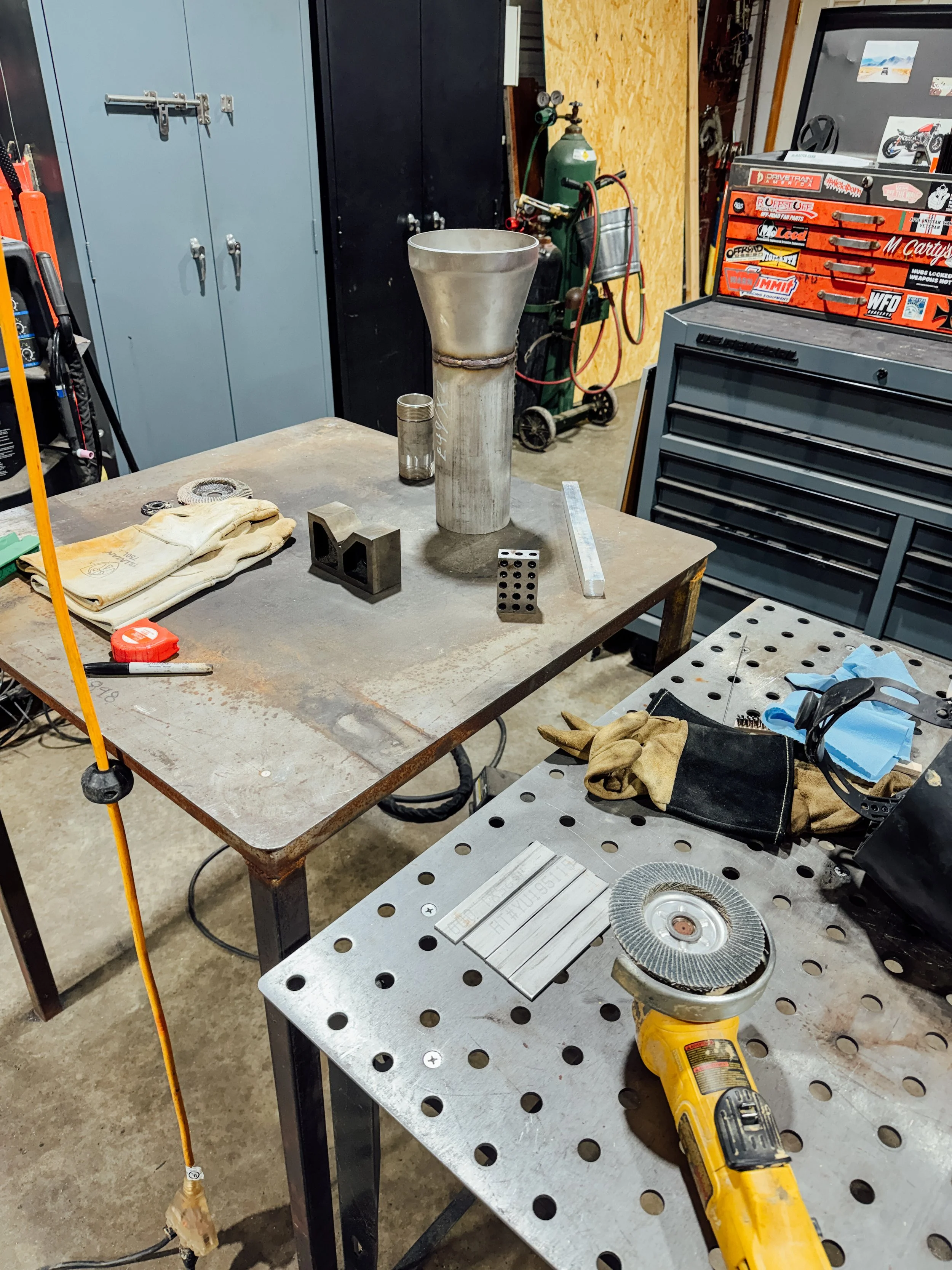 Close up of welded air gap assembly for water fill station in London Kentucky showing steel pipe and reducer weld