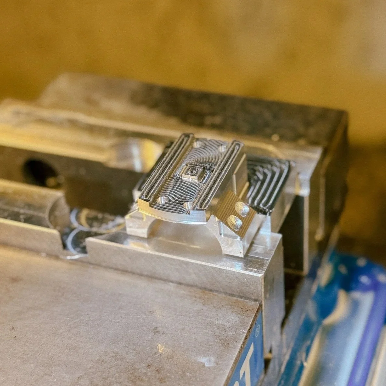 precision machined aluminum components on workbench ready for shipping to tennessee customers