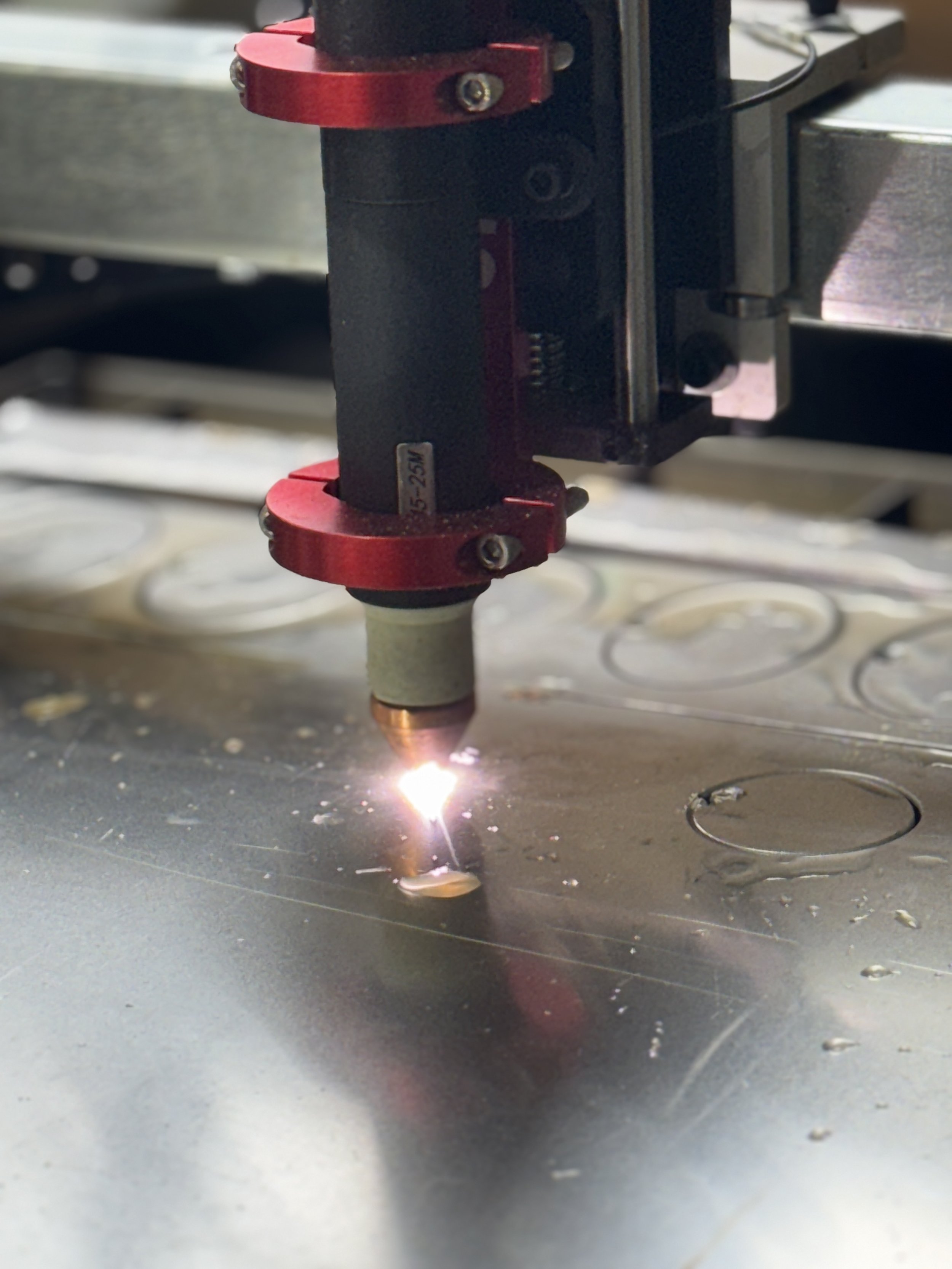 CNC plasma cutter cutting steel sign for business in London KY