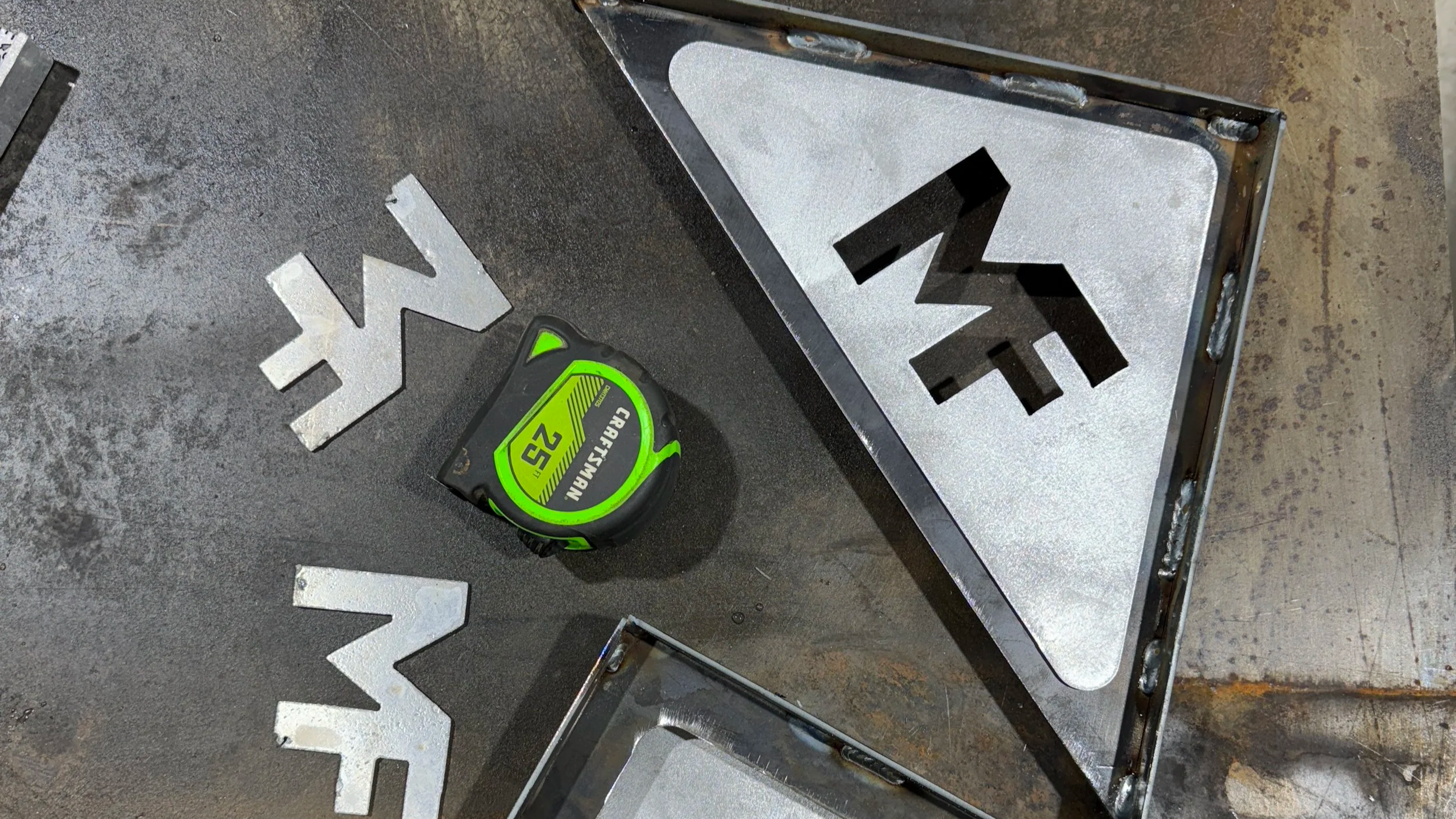 Plasma cutting brackets and tabs for equipment repair shop London KY