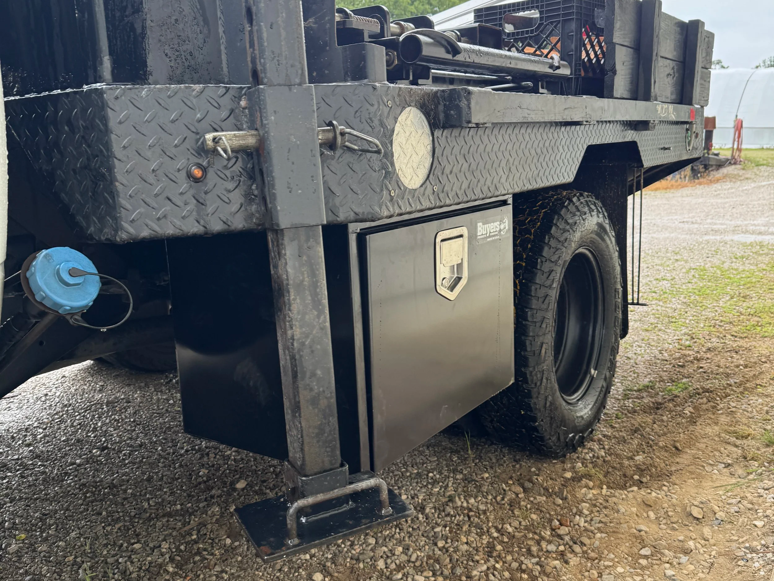 Fabricated steel angle iron mounts for underbody toolbox before installation