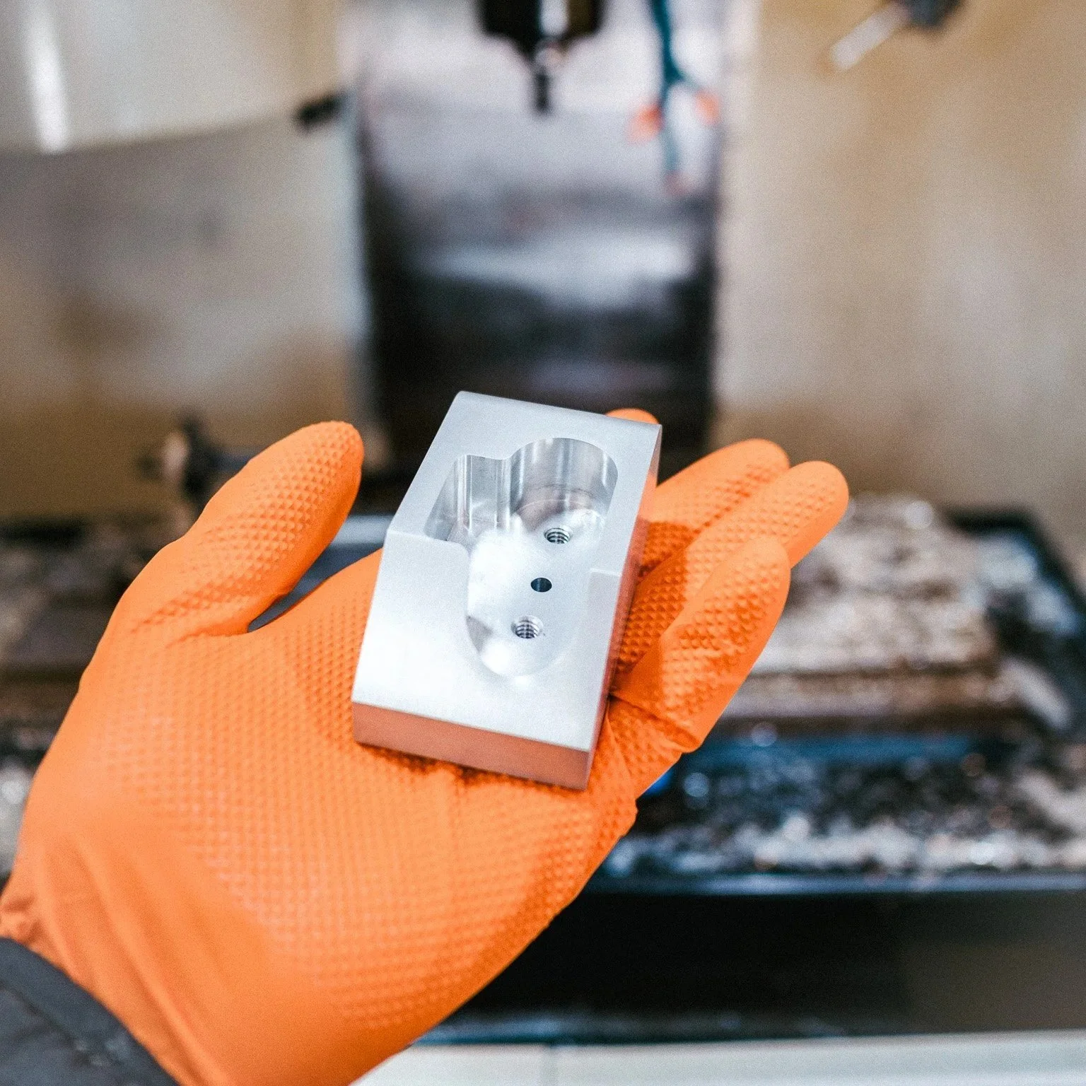 Machined aluminum part with precision features and clean CNC milled surfaces