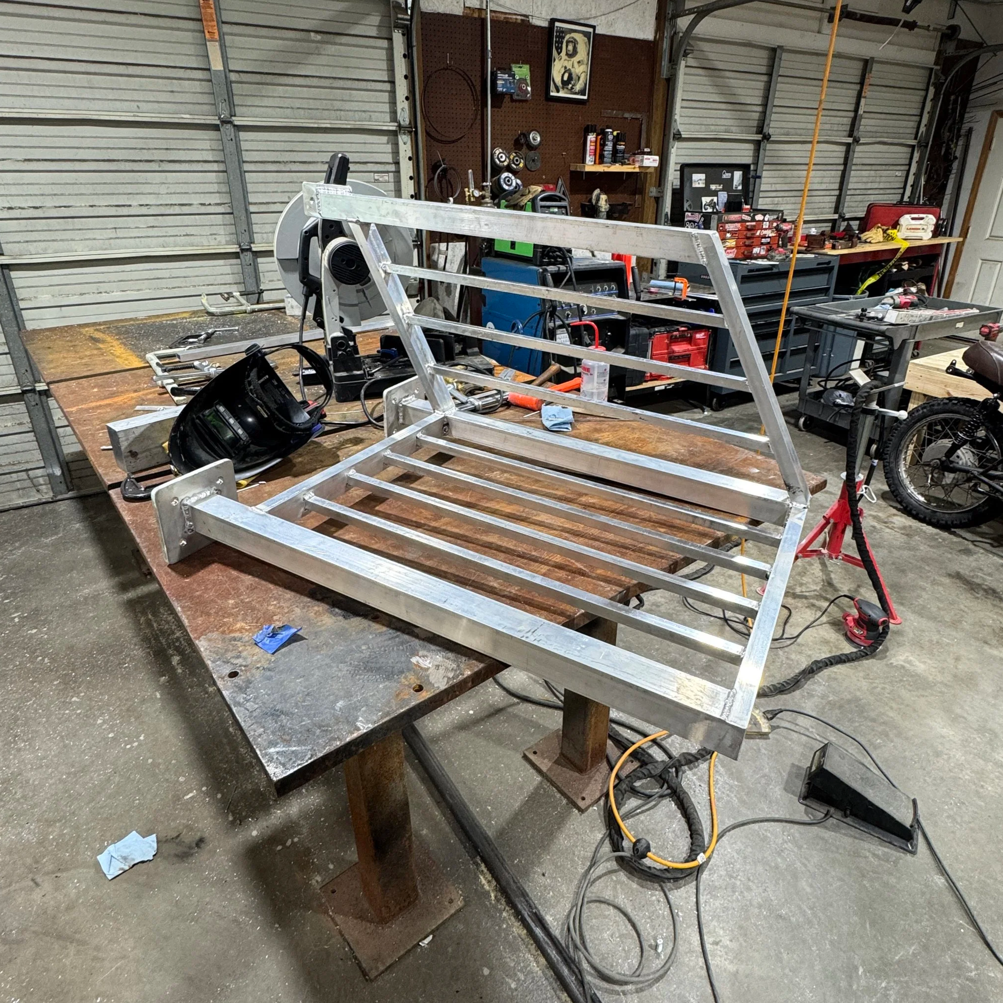 Side view of a custom aluminum handrail providing safe access to a residential front porch in Corbin, Kentucky.
