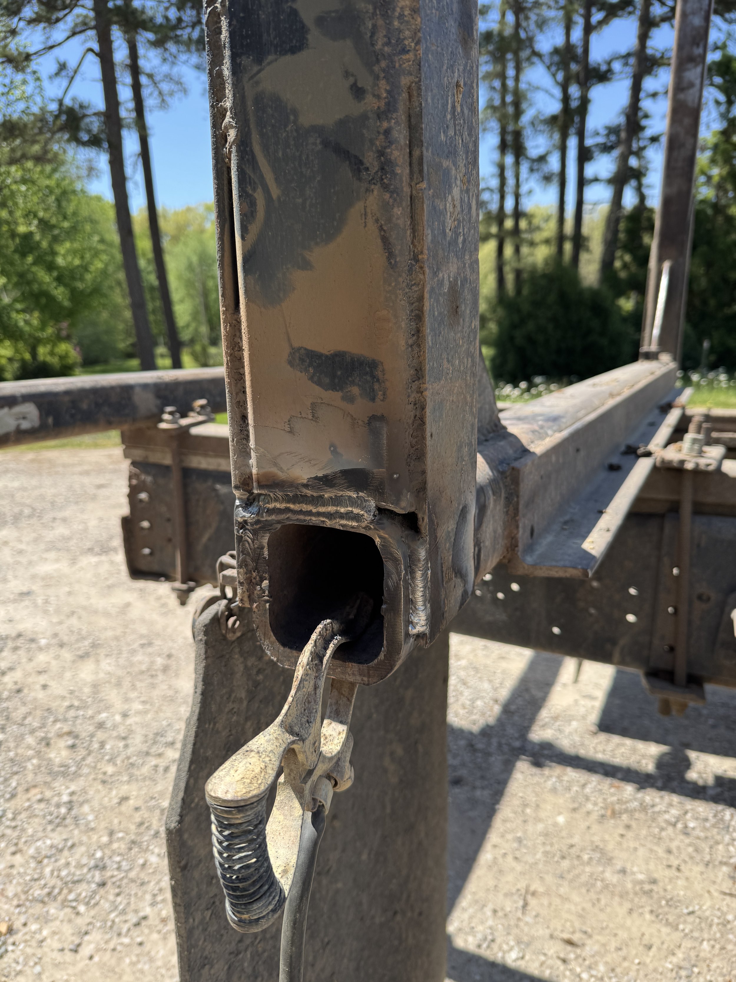 Welded log truck frame repair using 6011 root and 7018 cap in London Kentucky mobile welding service